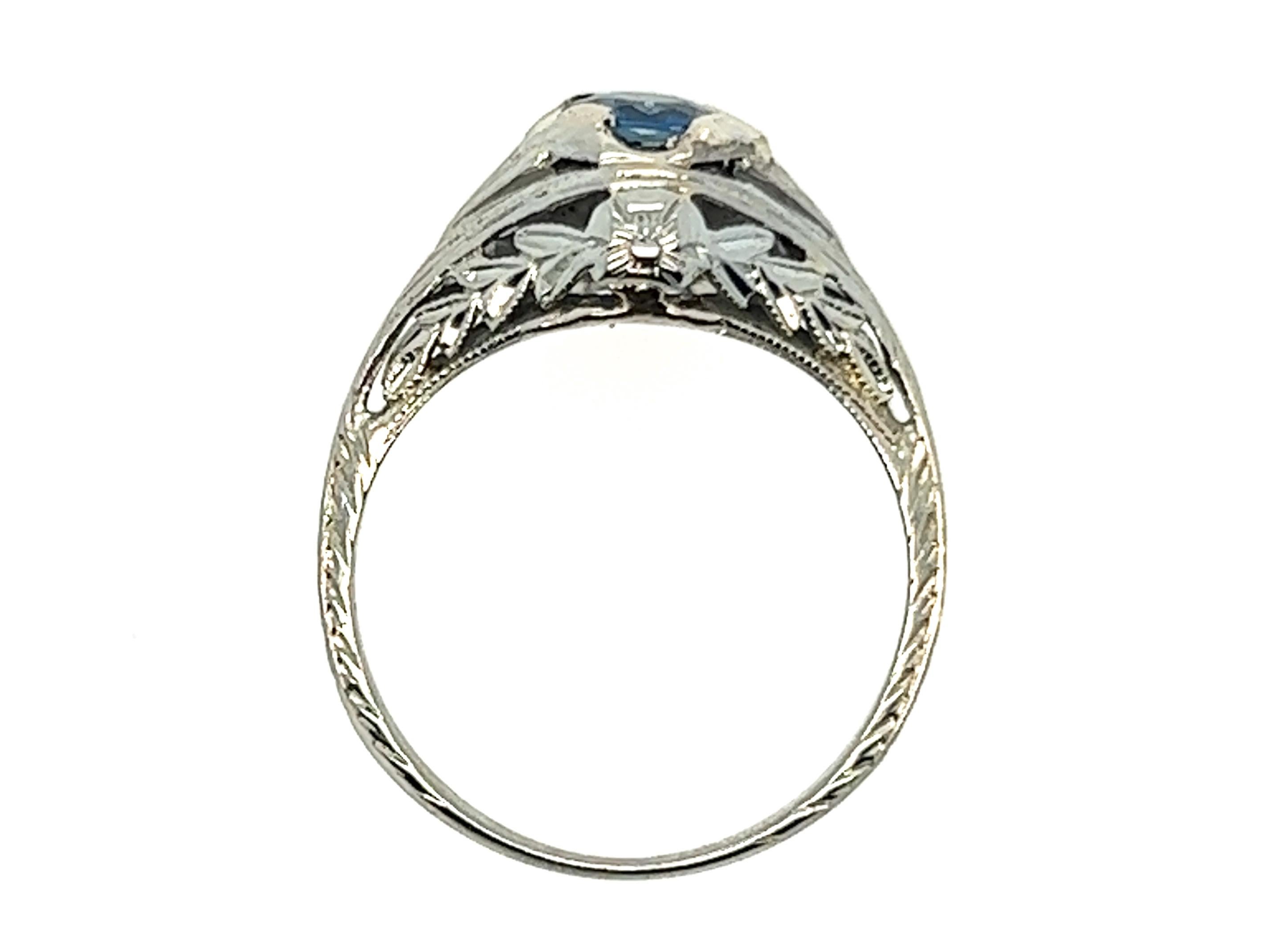 Genuine Original Art Deco Antique from the 1920's Sapphire Solitaire Engagement Ring .65ct 18K White Gold 


Featuring a Magnificent .65 Carat  Genuine Natural Round Sapphire Gemstone

Striking  Hand Engraved Flowers and Filigree 

Solid Gold