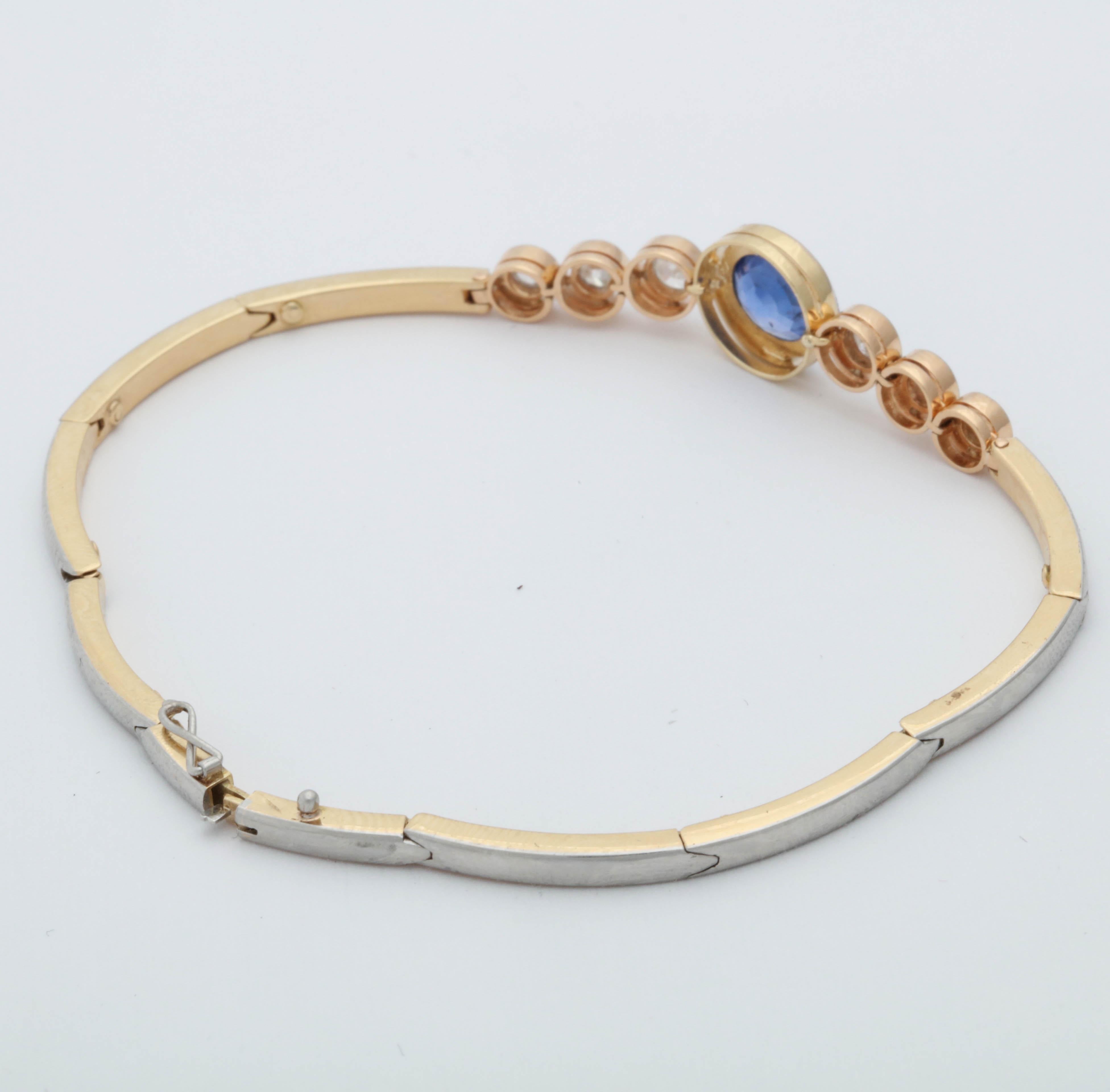 Oval Cut Art Deco Sapphire with Diamonds Platinum and Gold Halfway Flexible Bracelet