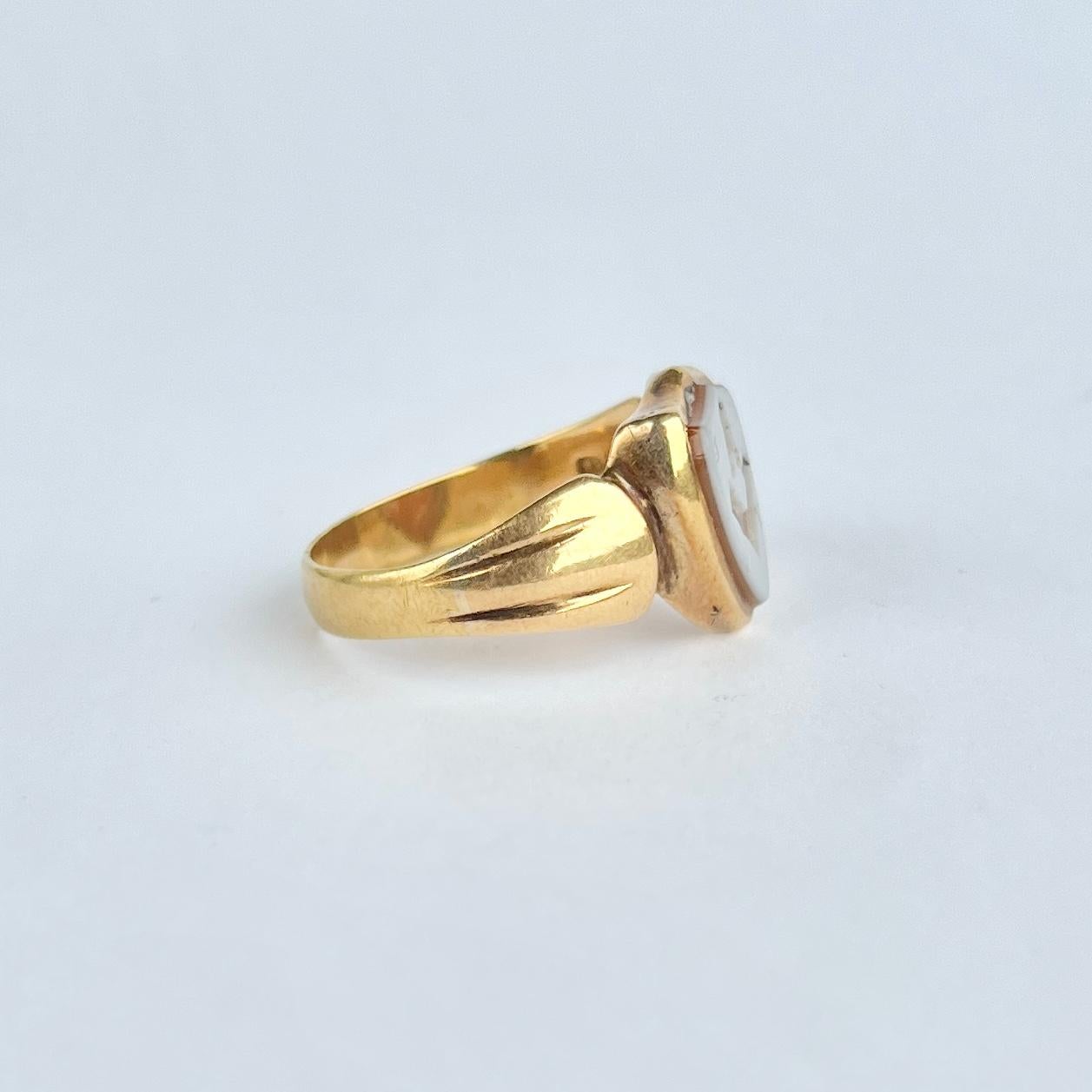 A superb masonic signet ring, set with a brilliant shield cut sardonyx and modelled in 18carat yellow gold. 

Ring Size: R 1/2 or 8 3/4
Stone Dimensions: 11x10mm

Weight: 4.9g