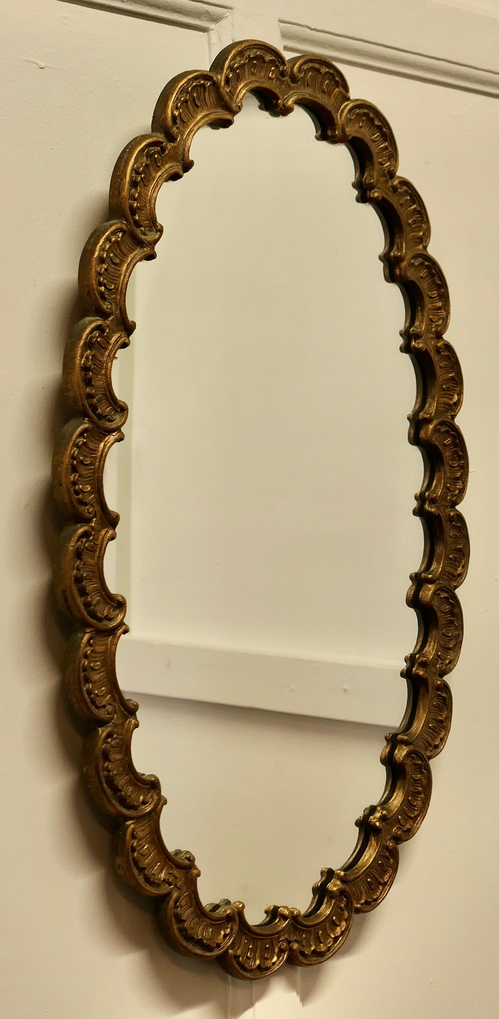 oval scalloped mirror