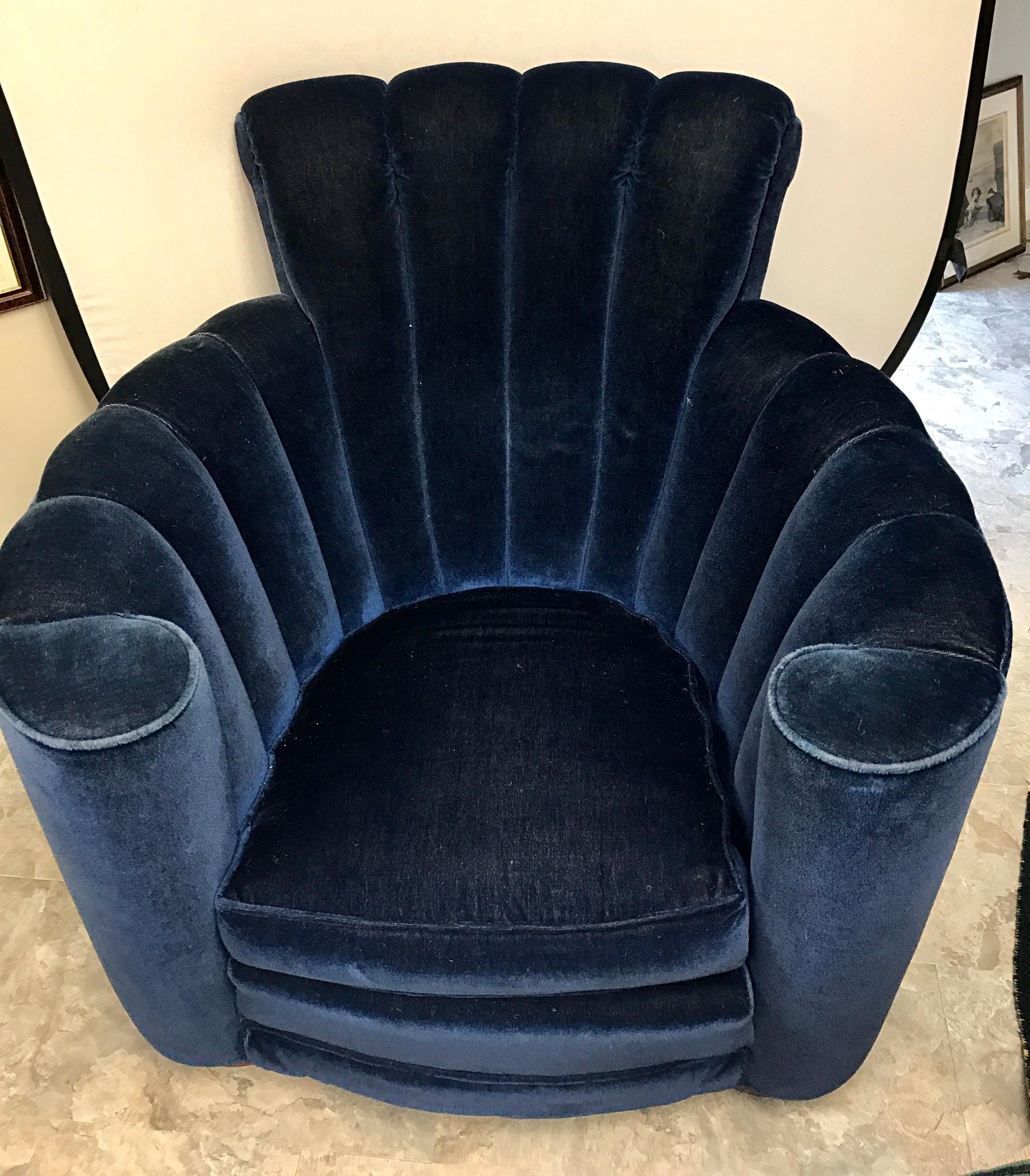 Large curved scalloped Art Deco armchair. Upholstery is blue mohair velvet and is original to the chair which dates to the 1970s.
