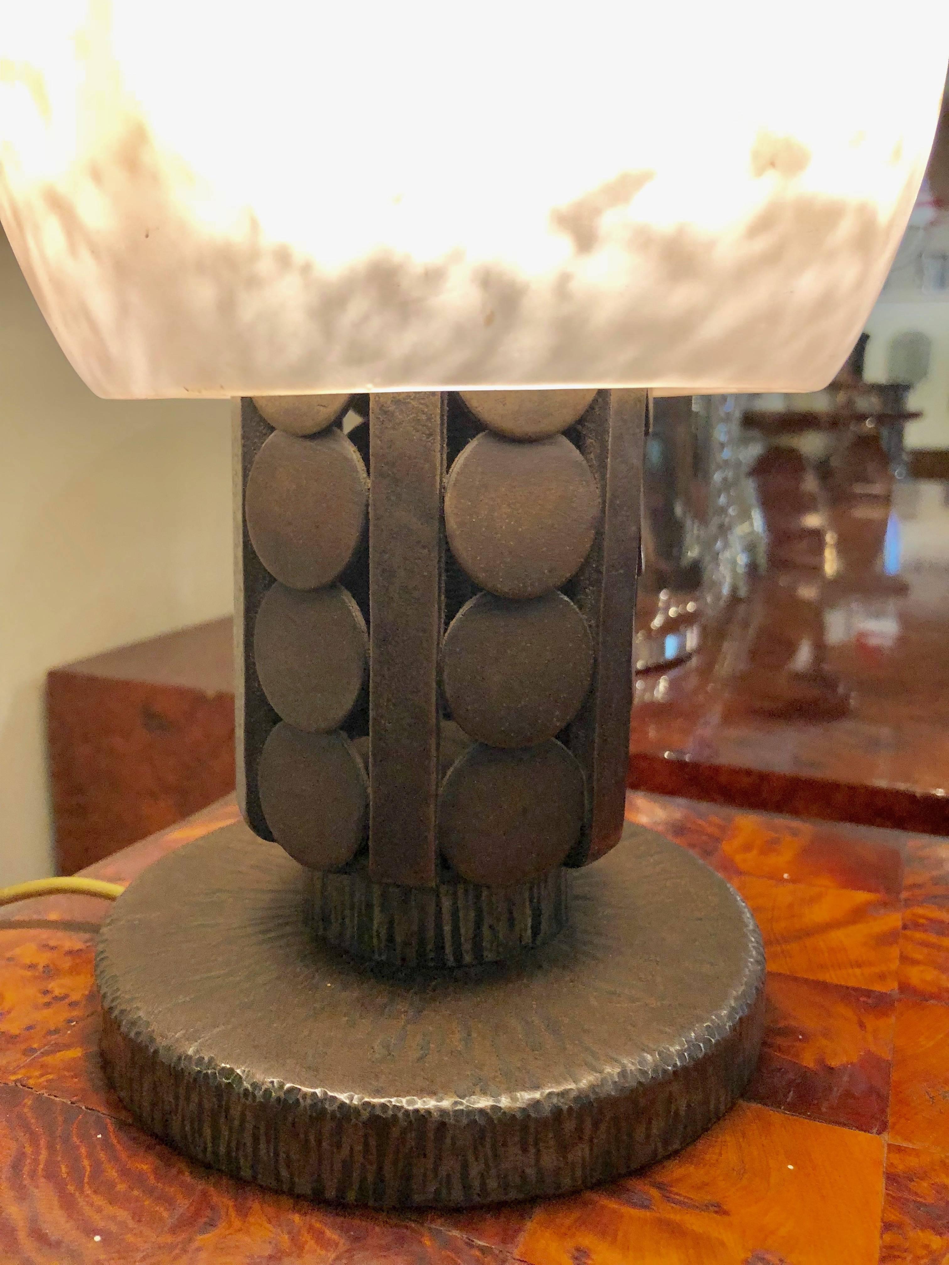 Exceptional and rare Art Deco iron table lamp. French fer forge of the highest quality. Contemporary of Edgar Brandt, Raymond Subes and Paul Kiss, this iron lamp signed on the base by designer Katona. Great looking with a mushroom style spotted