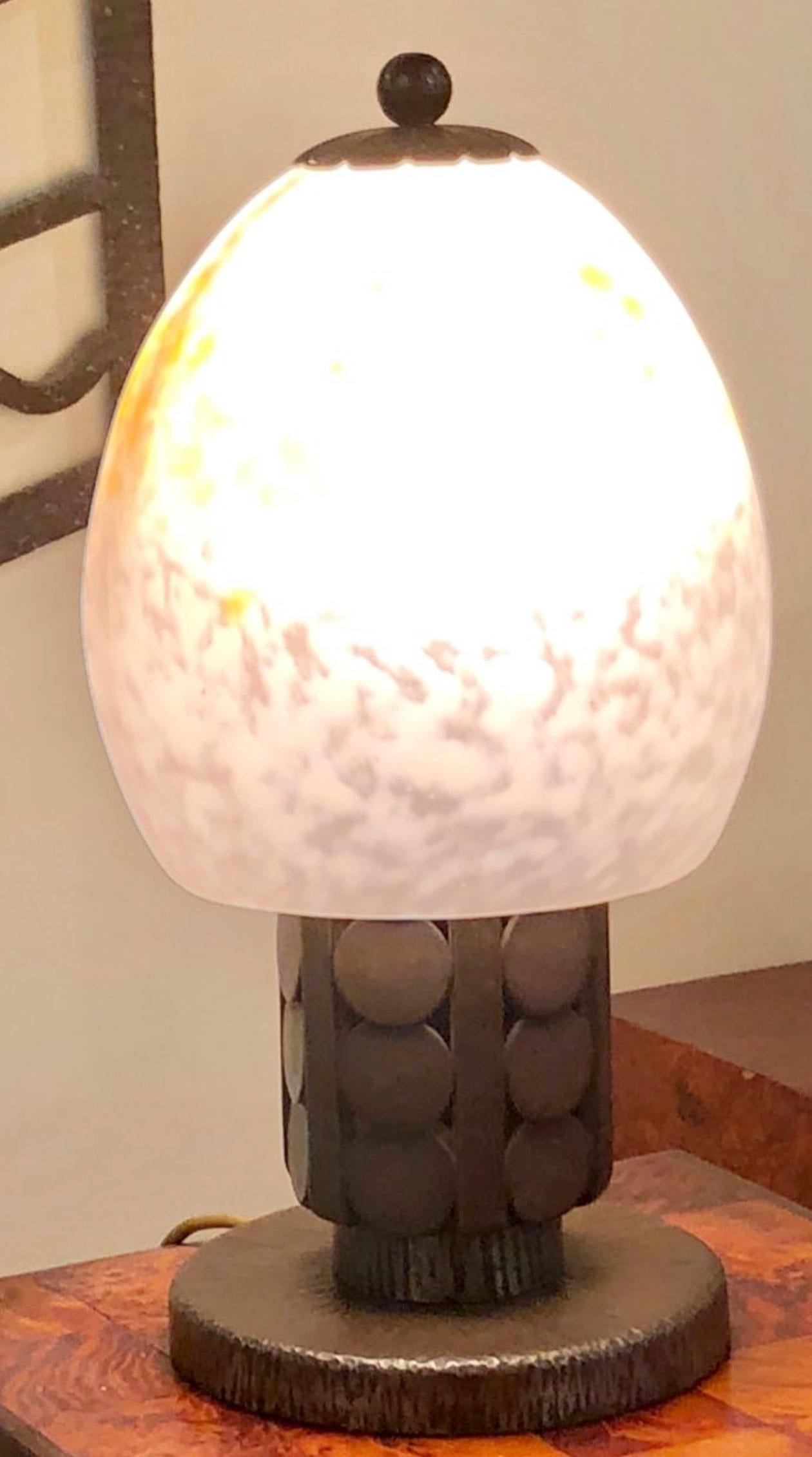 Exceptional and rare Art Deco iron table lamp. French fer forge of the highest quality. Contemporary of Edgar Brandt, Raymond Subes and Paul Kiss, this iron lamp signed on the base by designer Katona. Great looking with a mushroom style spotted