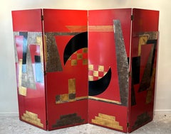 Art Deco screen with Cubist motifs in red lacquer, circa 1940.