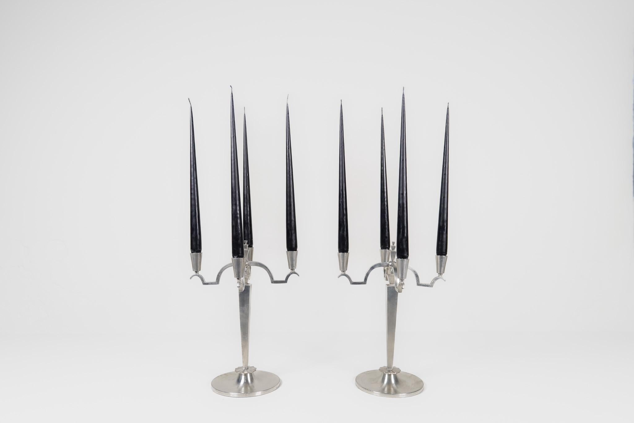 Wonderful, sculptured Art Deco candelabras made in pewter. Made in Sweden, 1940s-1950s
The Art Deco details in these two pieces are great and detailed. 

Good vintage condition.

Dimensions: H 32cm, W 22 cm


