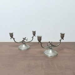 Art Deco Sculptural Svenskt Tenn Pair of Pewter Candleholders with Archer Motif