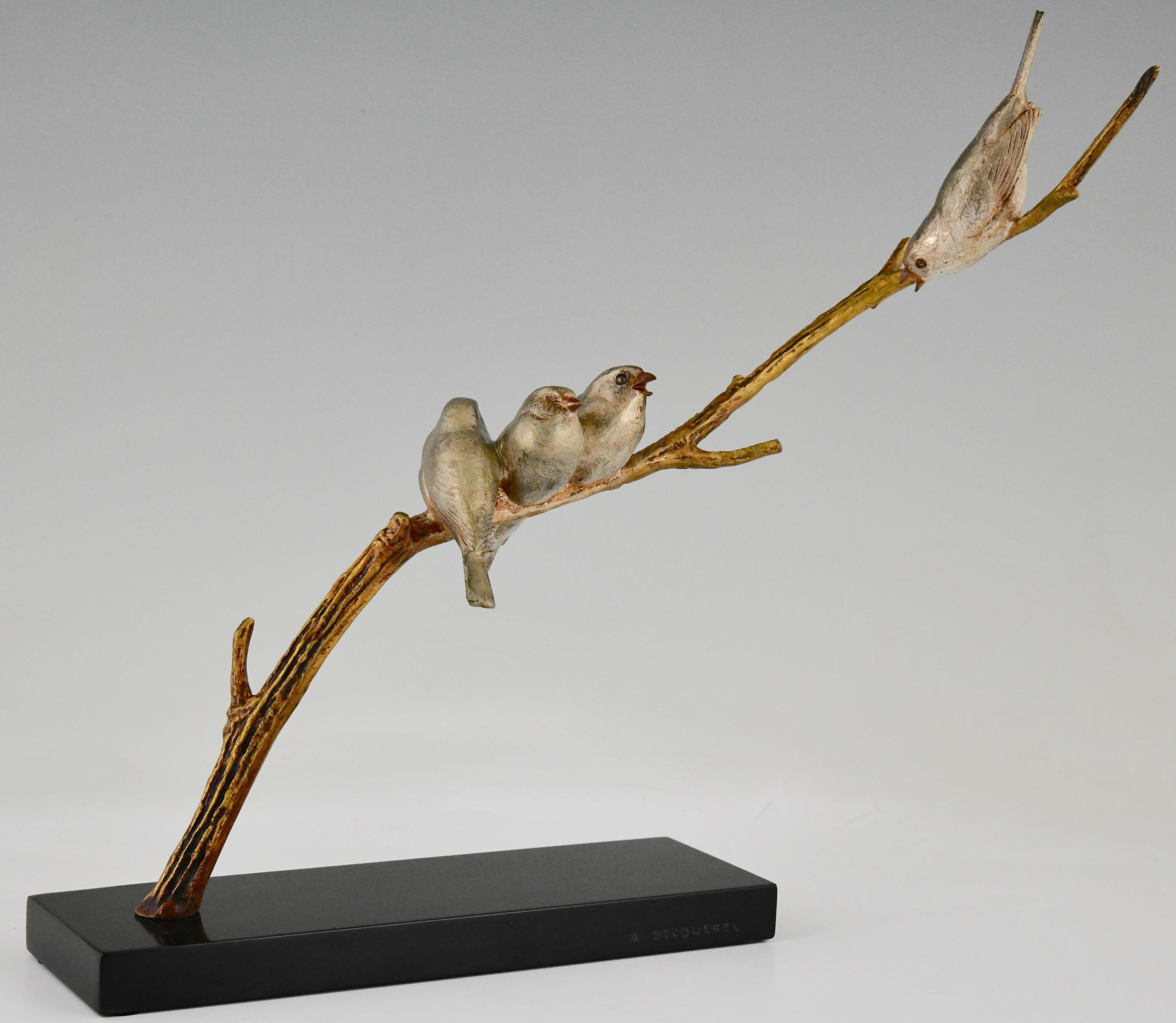 Art Deco sculpture 4 birds on a branch signed by André Vincent Becquerel.
Bronze with silver and gilt patina mounted on a Belgian Black marble base.
France 1930. 
This model is illustrated in the book
Animals in bronze, Christopher Payne.
