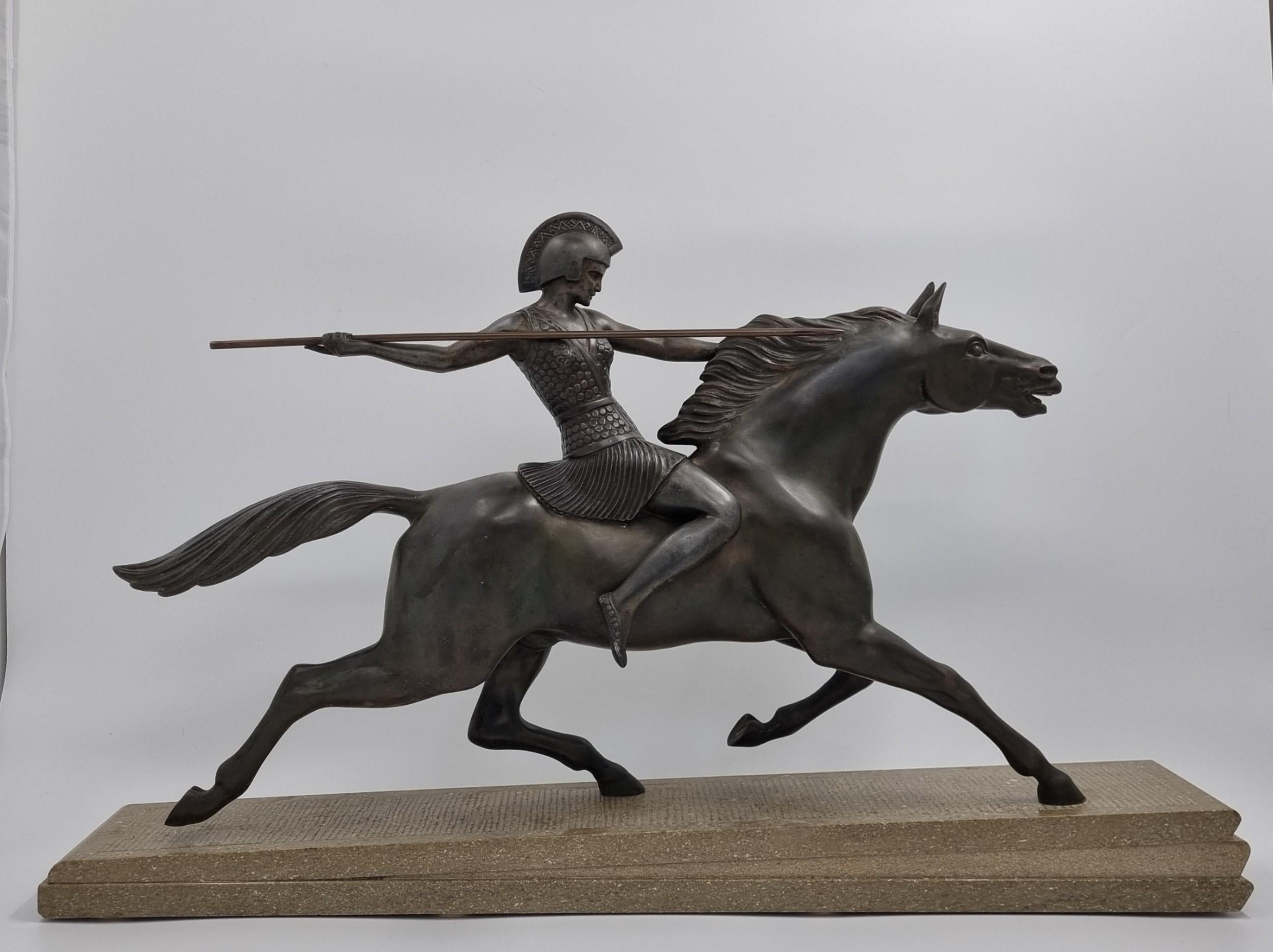 A stunning Art Deco Sculpture depicting an Amazon Warrior riding a horse.

Cold painted spelter, mounted on wedge-shaped, marble base, stylised as a Roman road.

An impressive piece of the finest quality, that rarely becomes available for