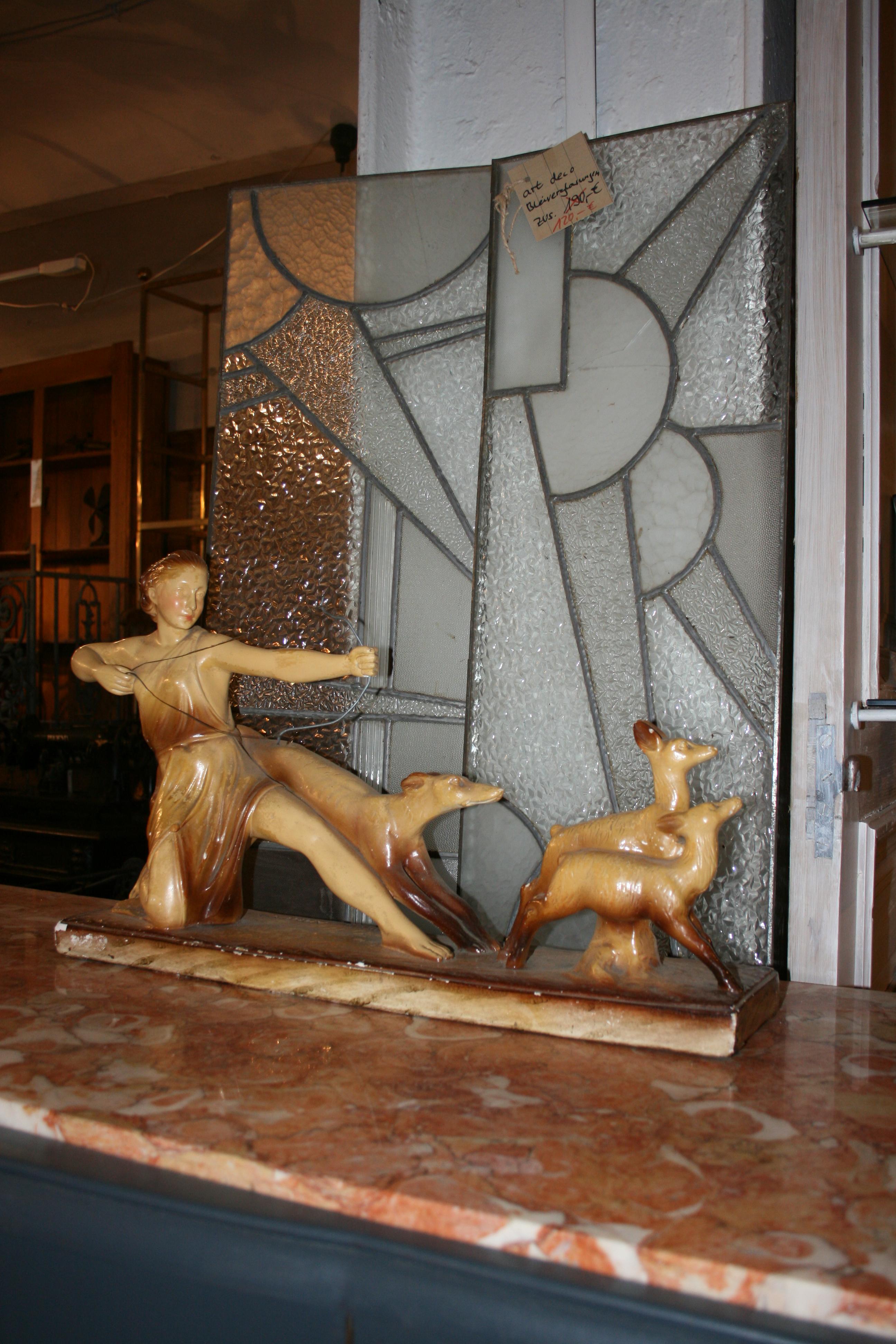 French 1930s Art Deco sculpture made of hand painted plaster with engraving on the pedestal 
