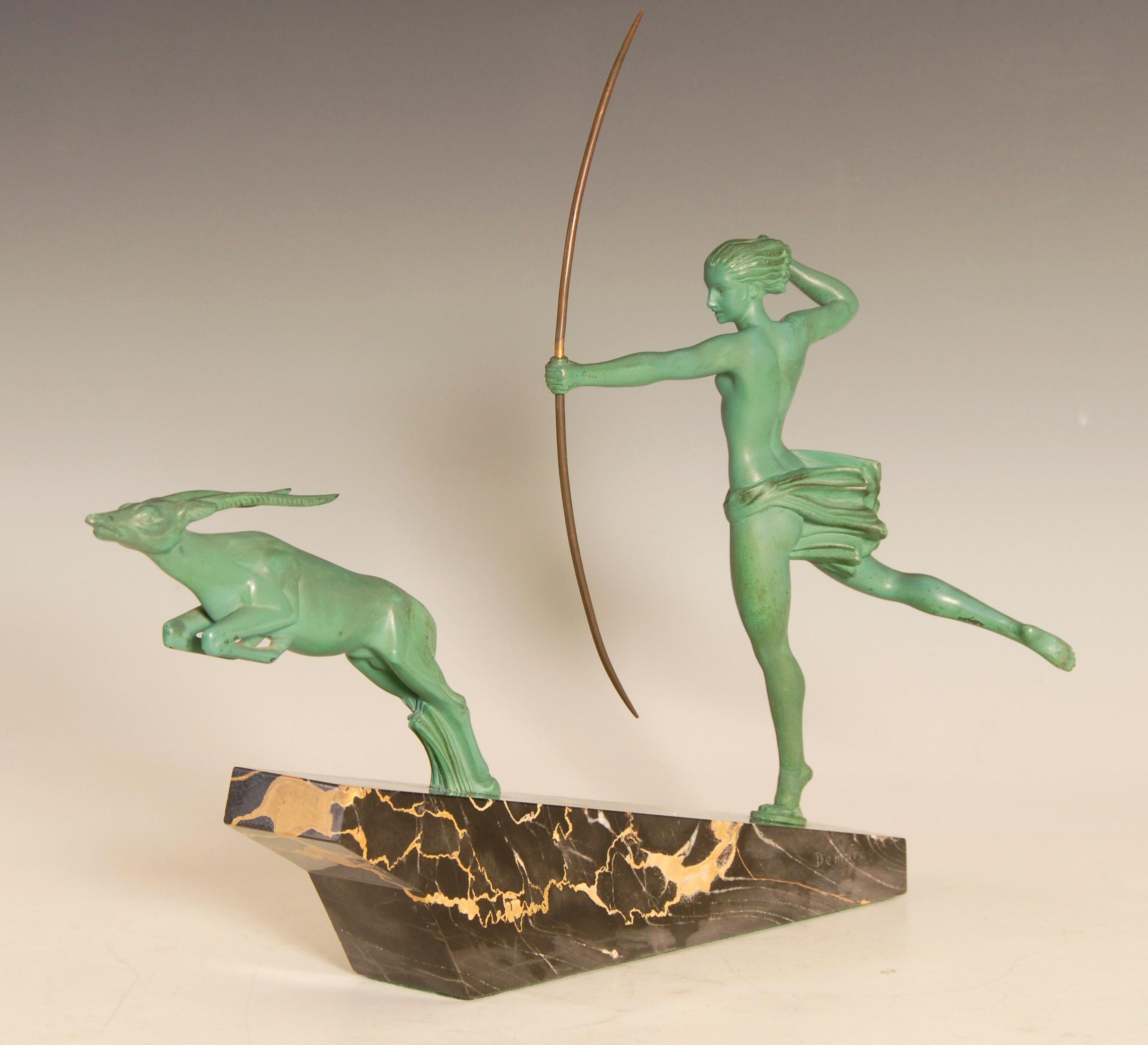Art Deco sculpture from the Max Le Verrier foundry in Paris, signed De MarCo who was one of the artists working at the foundry, circa 1930.
Patinated spelter on marble base.

     