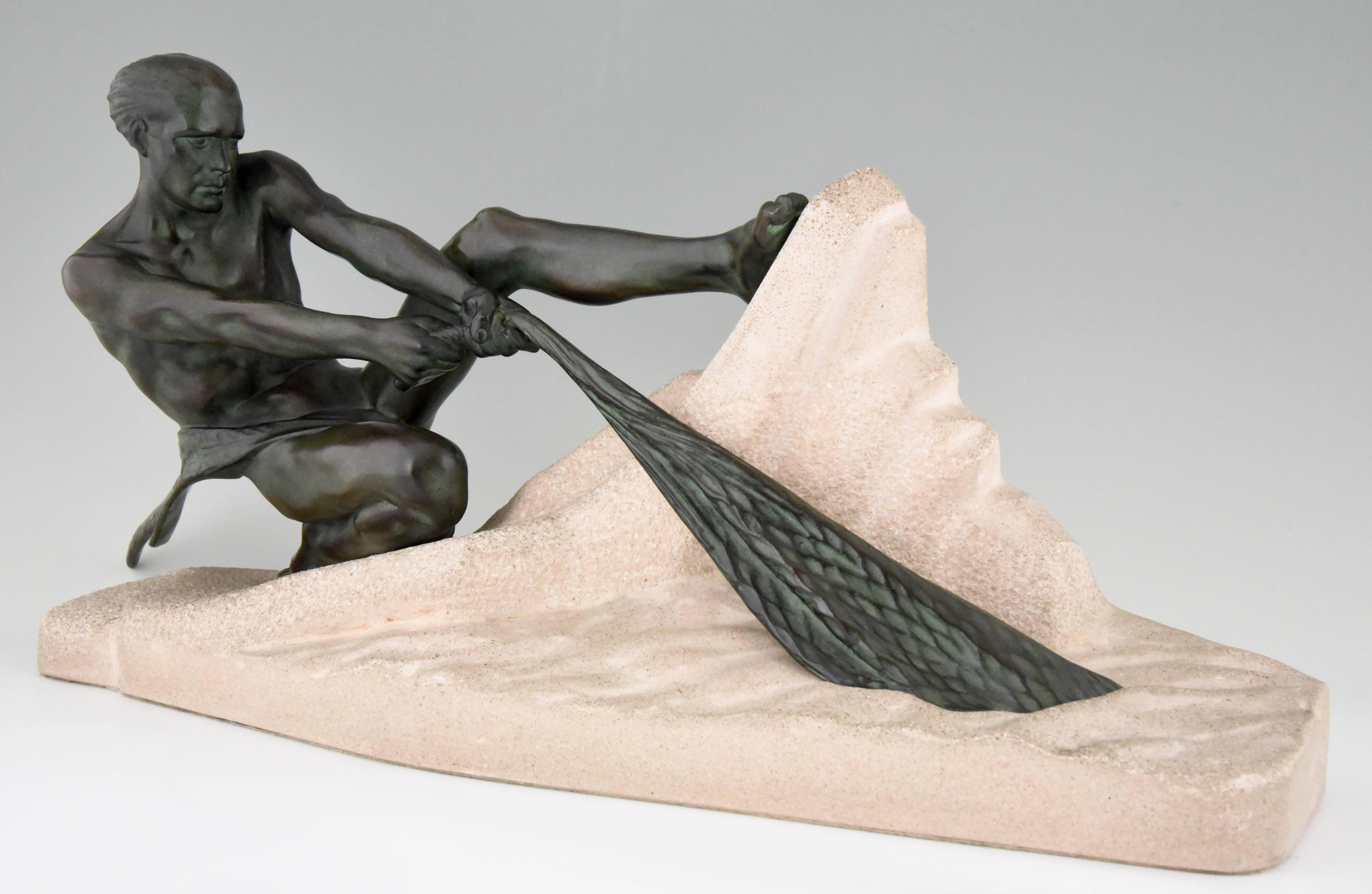 Strong Art Deco sculpture of an athletic fisherman pulling a net by the famous French sculptor Max Le Verrier. The sculpture has a lovely green patina, is signed and stands on a carved stone base, France, circa 1930.
 