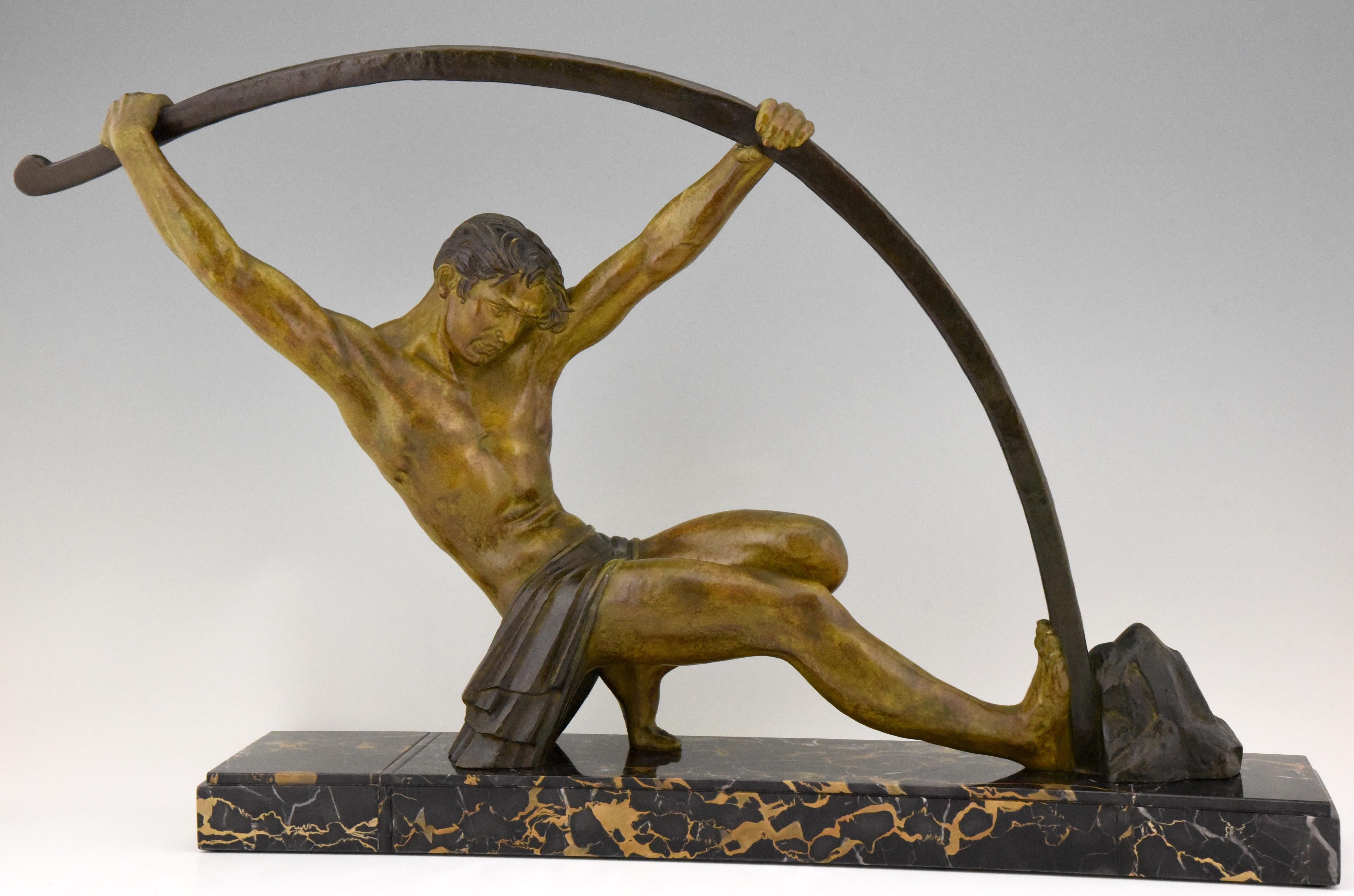 Impressive Art Deco sculpture of an athletic man bending a bar.
This work is titled l'age du bronze and signed by Demetre H. Chiparus.
The sculpture has a beautiful patina and stands on a fine Portor marble base France circa 1930.

This model is