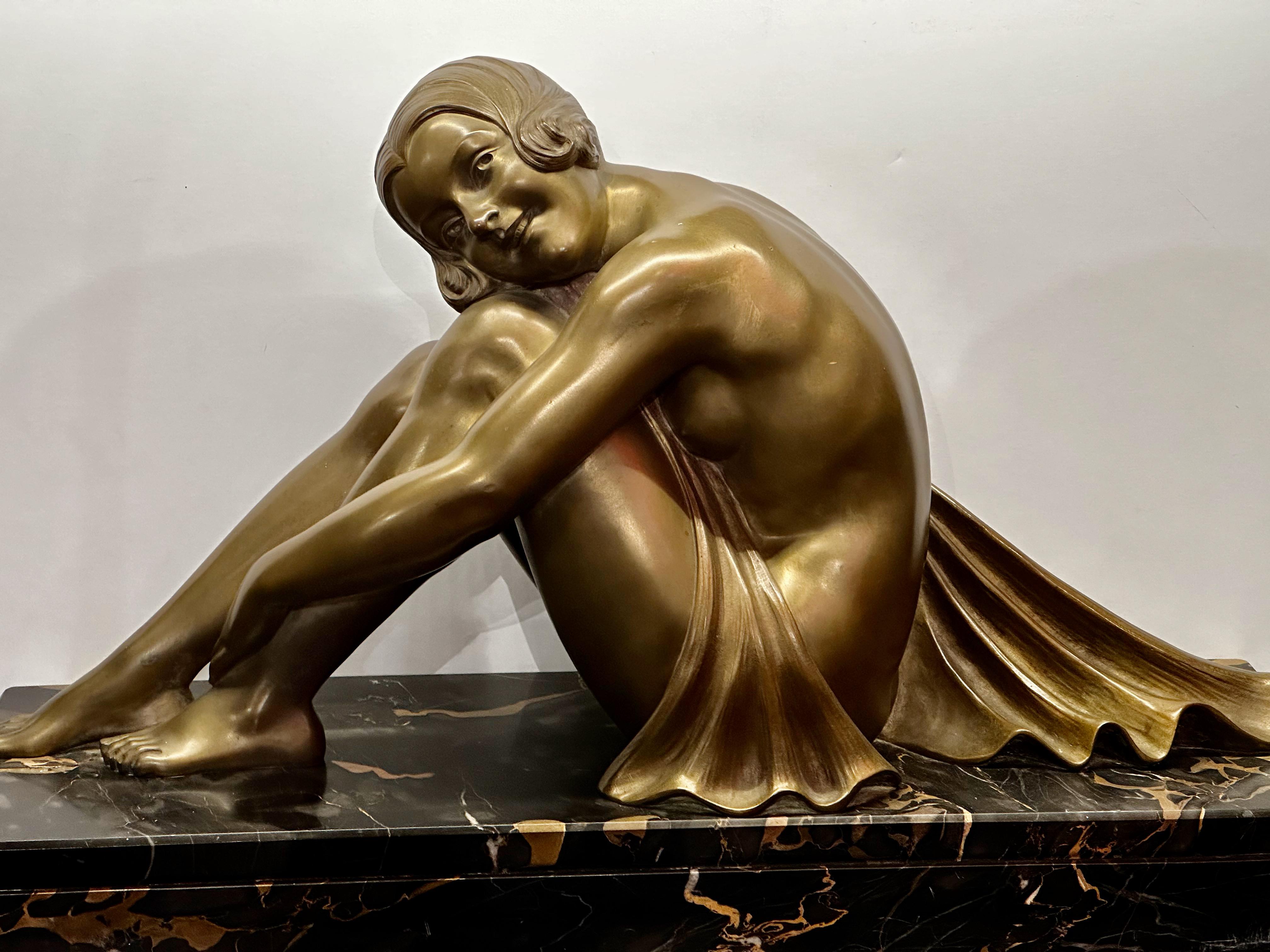 An Art Deco Bronze Statue by Armand Godard, produced by the Parisian foundry of Edmond Etling. This is an example of a high style rendered in the highest quality. Nothing is more emblematic of the Art Deco Era than a sculpture of a sleek, nude