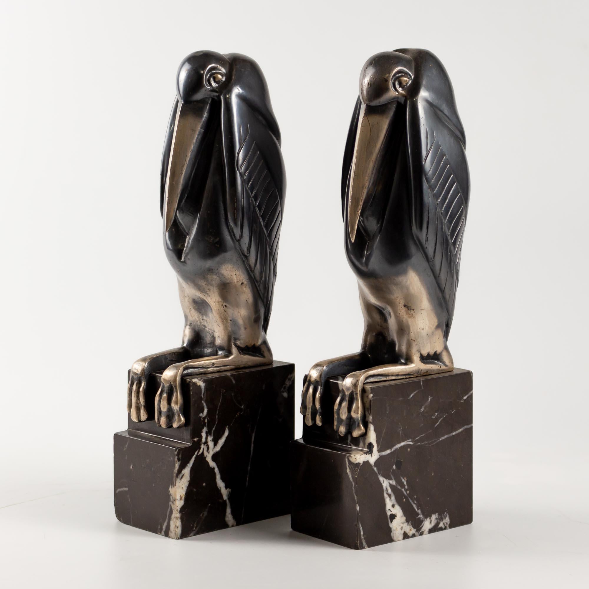 Ein Paar versilberte Art-Déco-Buchstützen aus Bronze von Marcel-Andre Bouraine (Französisch)