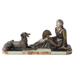 Art Deco Sculpture by Limousin of Woman Seated with Dog on Exotic Marble Base