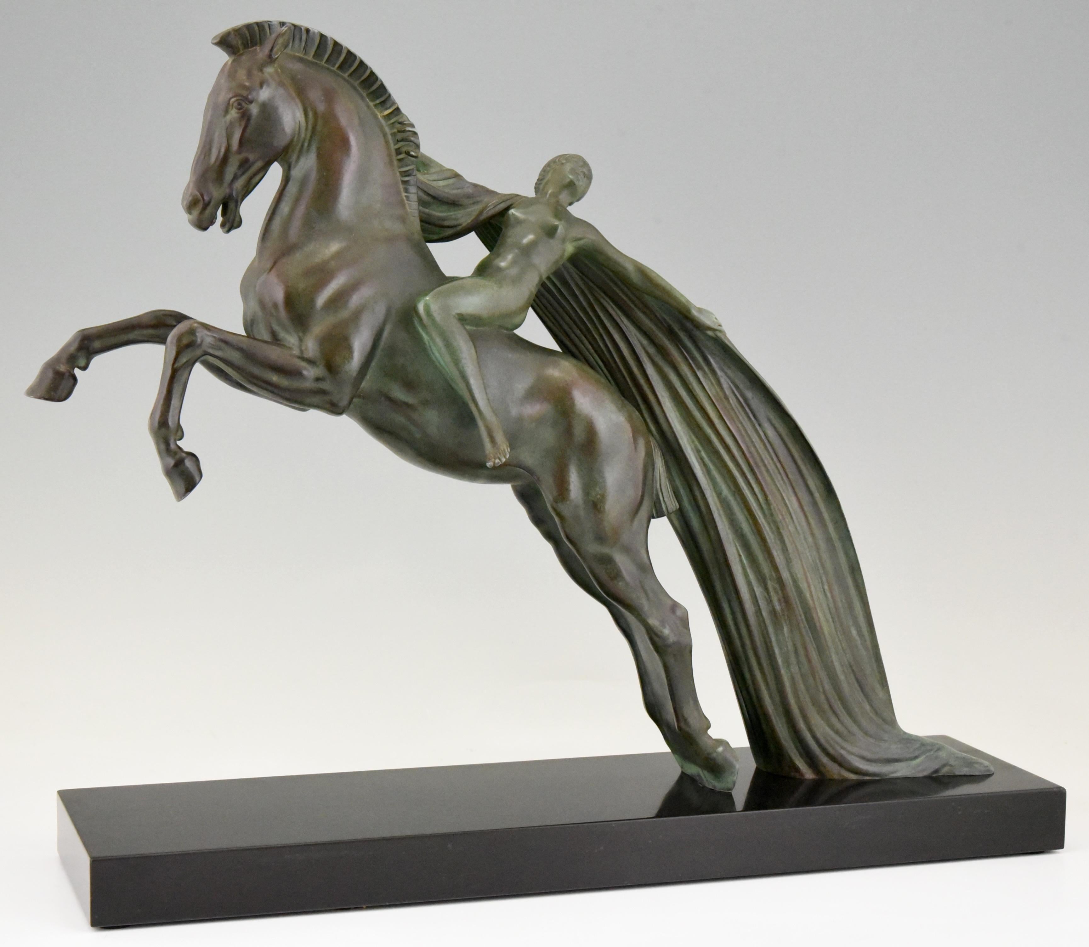 Spectacular Art Deco sculpture of a nude on a rearing horse by the artist Charles Charles for Max Le Verrier.
France, circa 1930.
Lovely green patina, Belgian black marble base. 

Literature:
“The dictionary of sculptors in bronze” by James