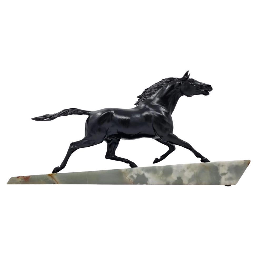 Sculpture Art déco chevauchant un cheval de chasse par Gonez  en vente