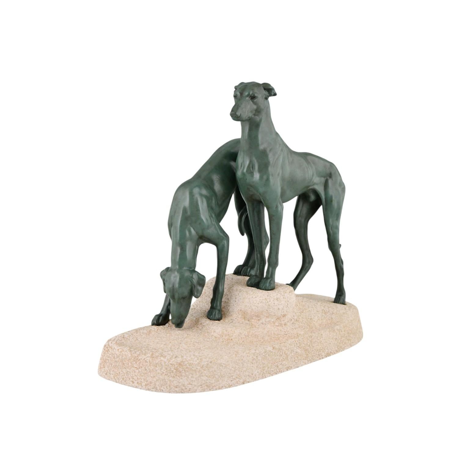 Art Deco sculpture of two greyhounds, 
Soif du desert, by the French artist Jules Edmond Masson, edited by Max Le Verrier. 
Patinated Art metal on stone base, 1930. 

This model is illustrated in:
Max le Verrier, un esprit Art Déco.  
Bénédicte
