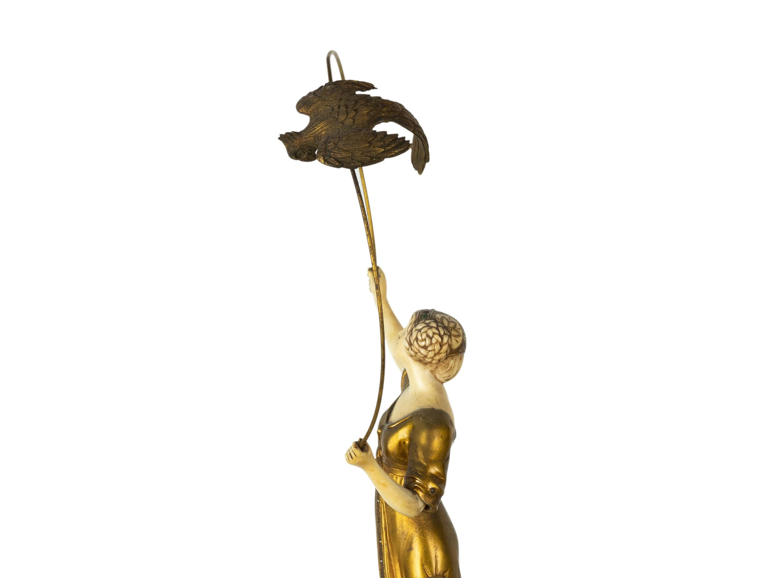 A very rare Hoop Dancer and Falcon in bronze, marble base and head and hands in ivory, dressed with a headband with shiny stones.
“Briand” signed (pseudonym of Marcel André Bouraine). 

Marcel Bouraine, in addition to being a grand Impressionist and