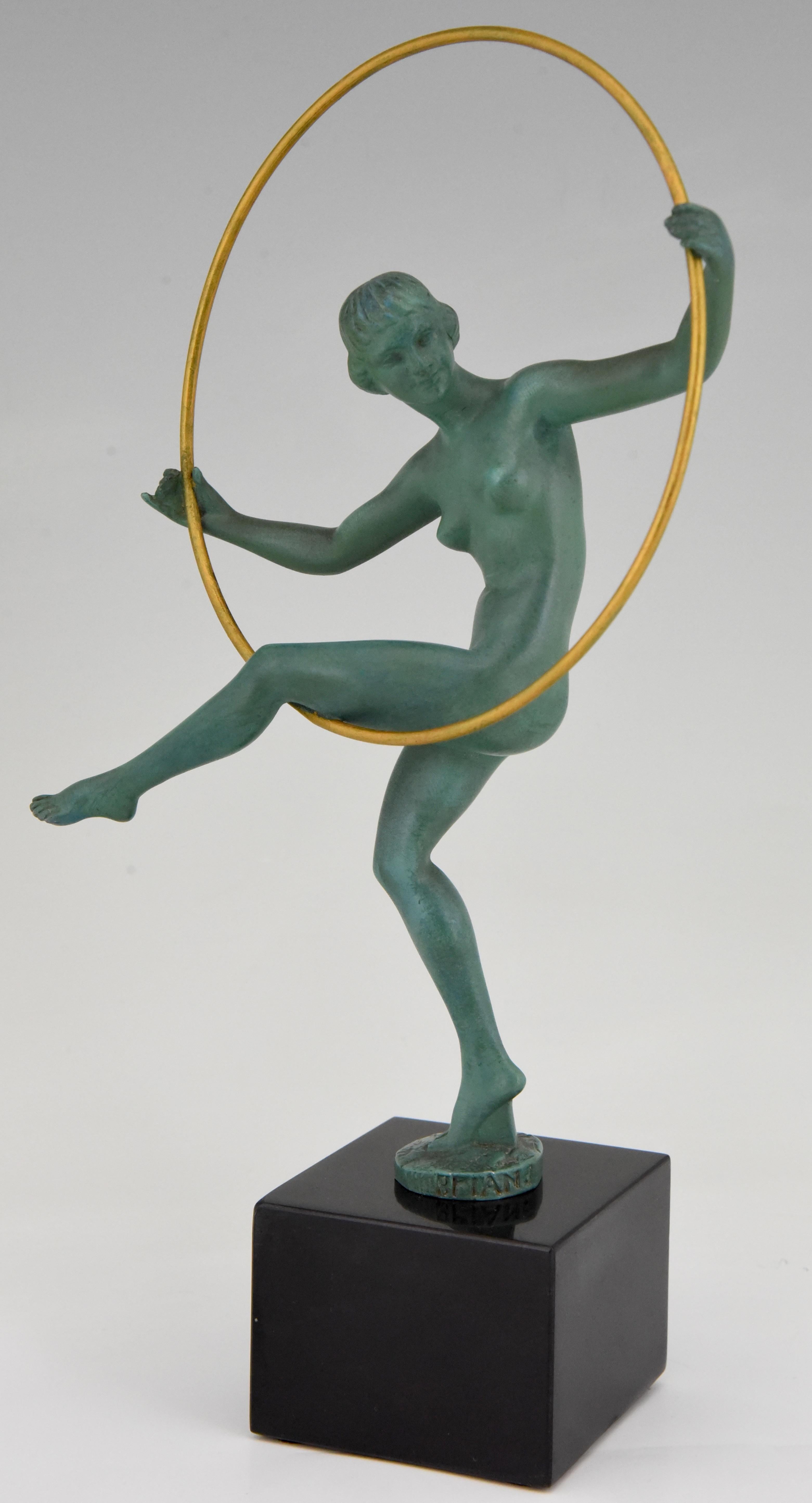 Art Deco sculpture of a dancing nude with hoop. The dancer is signed Briand, pseudonym of Marcel Andre Bouraine and cast at the Max Le Verrier foundry circa 1930. Art metal with green patina on black marble base.

“Art deco sculpture” by Victor