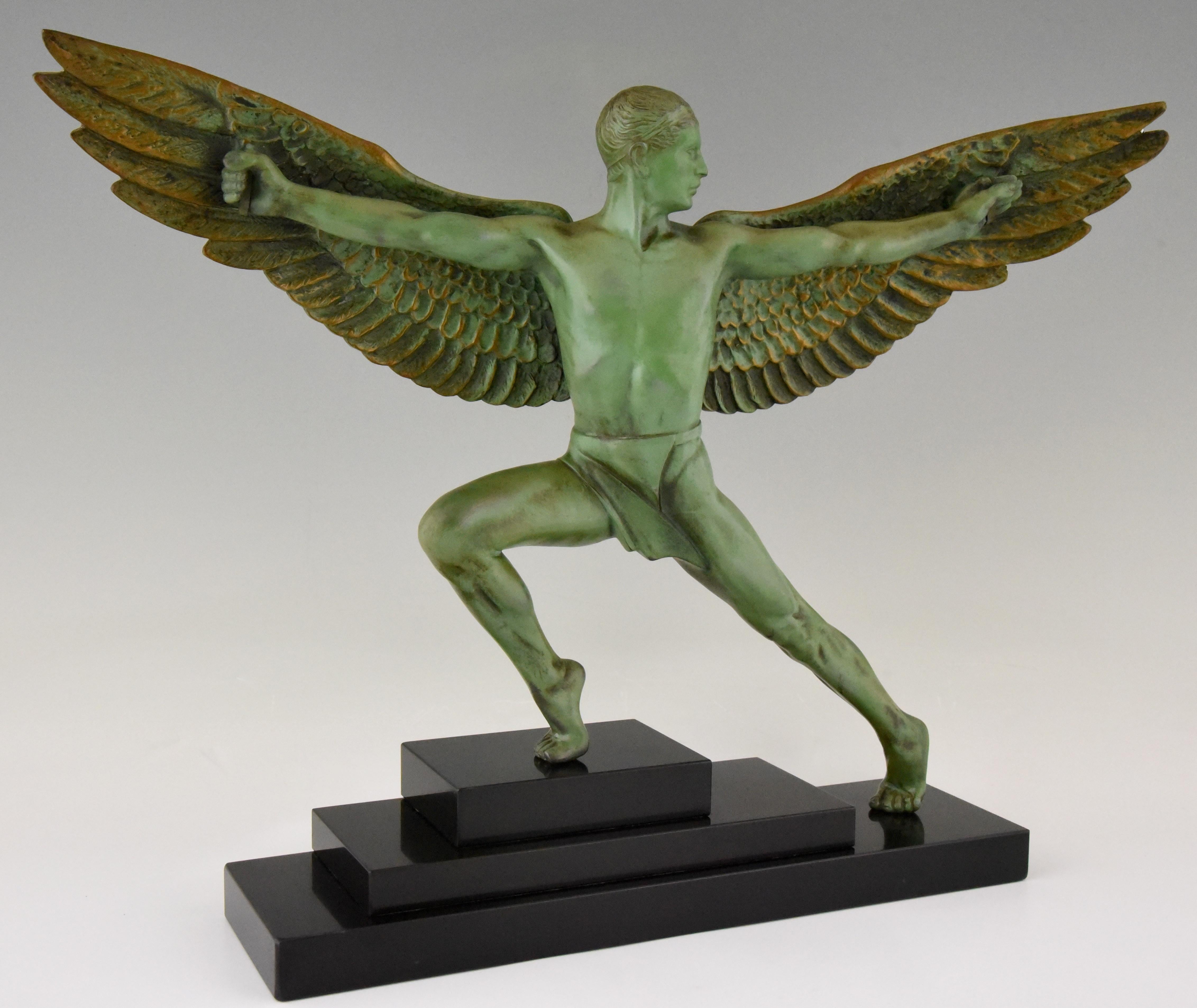 Beautiful large Art Deco sculpture of Icarus winged male nude. Signed by Max Le Verrier Art metal with lovely patina mounted on a Belgian Black marble base. France, circa 1930.

“Statuettes of the Art Deco period, Alberto Shayo. “Art Deco sculpture”