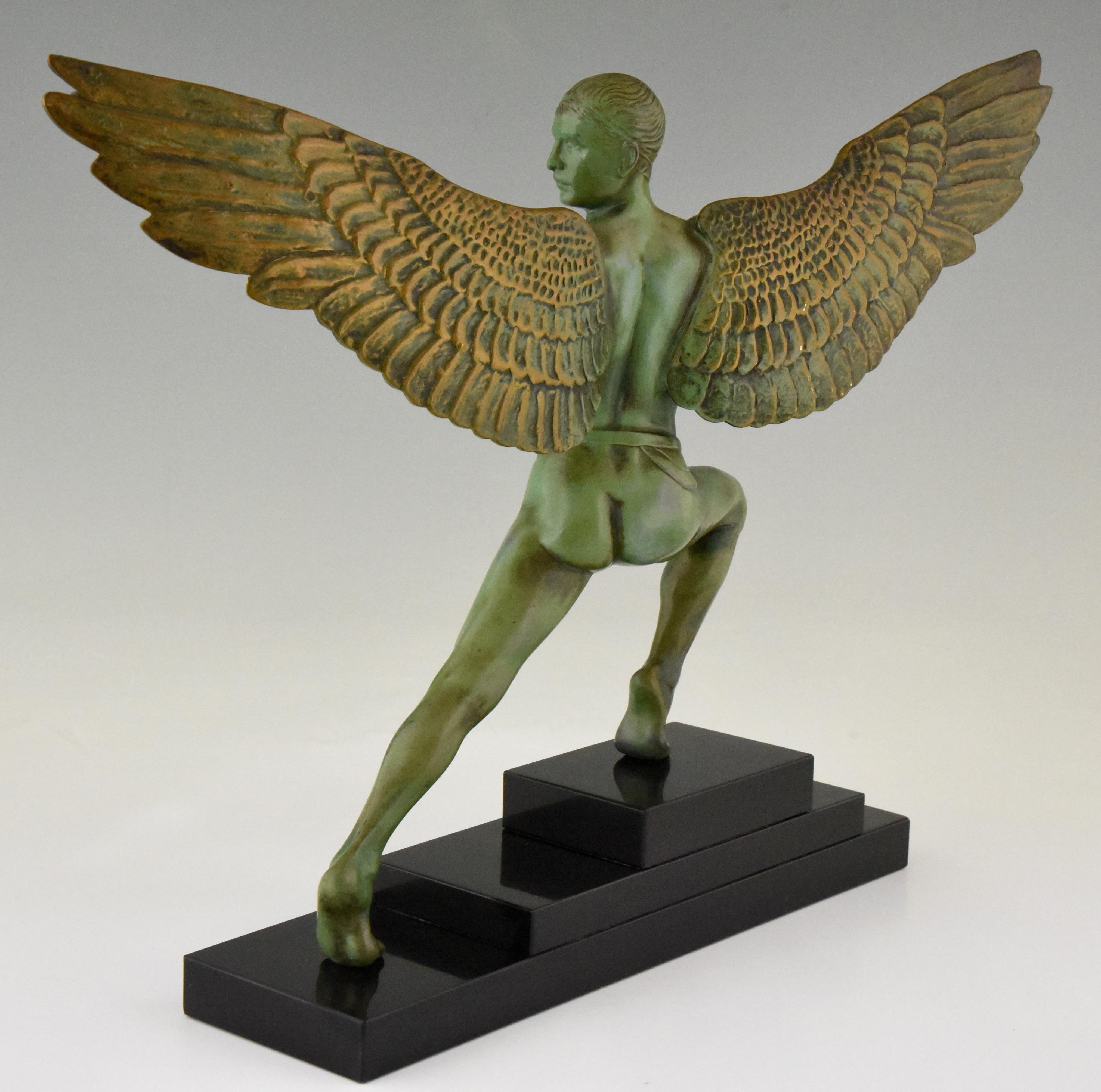 Patinated Art Deco sculpture Icarus winged male nude Max Le Verrier, 1930