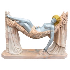 Art Deco Sculpture in Polychrome Marble of a Reclining Female Figure in a Hammoc