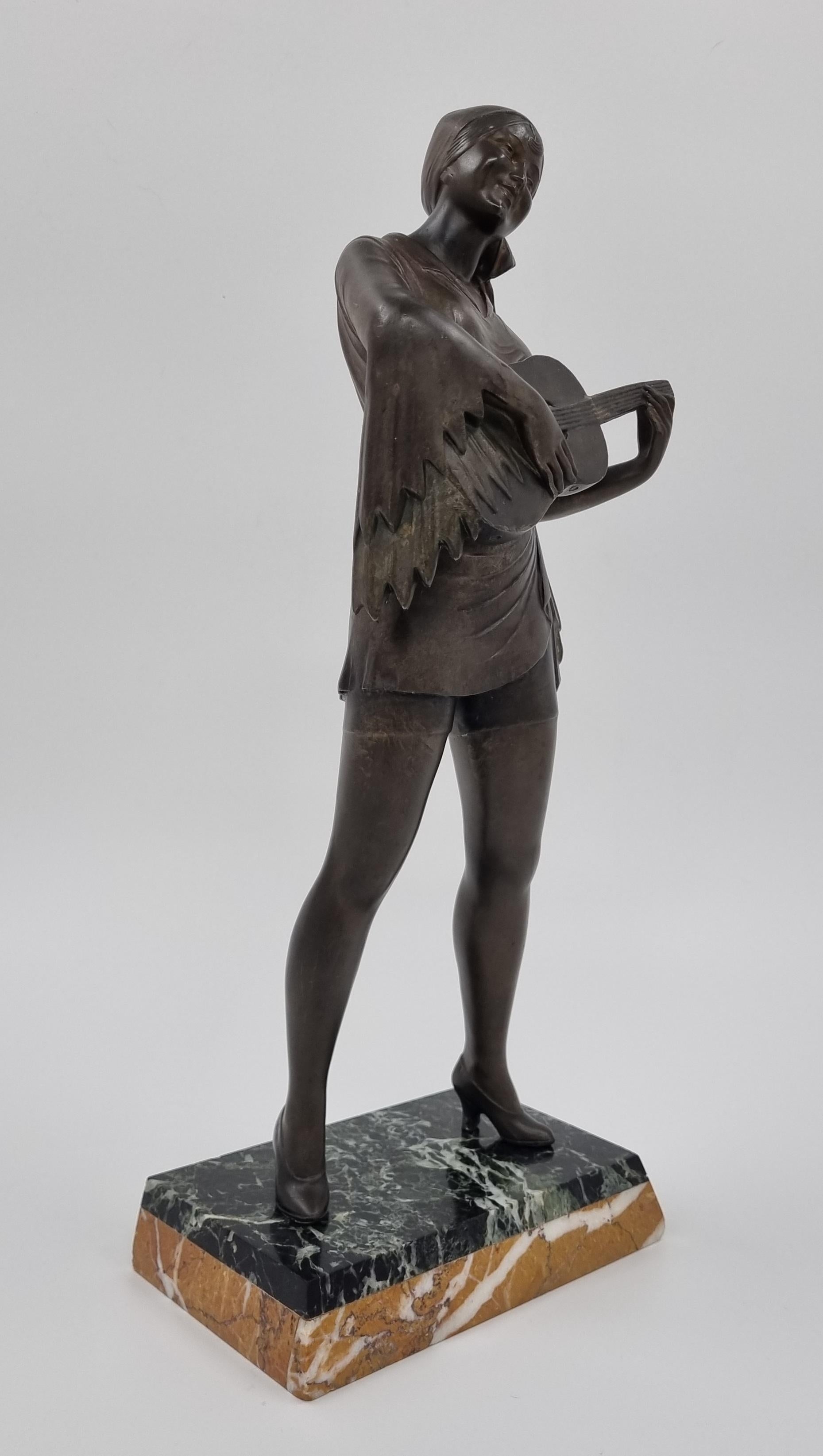 Spelter Art Deco Sculpture Lady Playing the Guitar For Sale