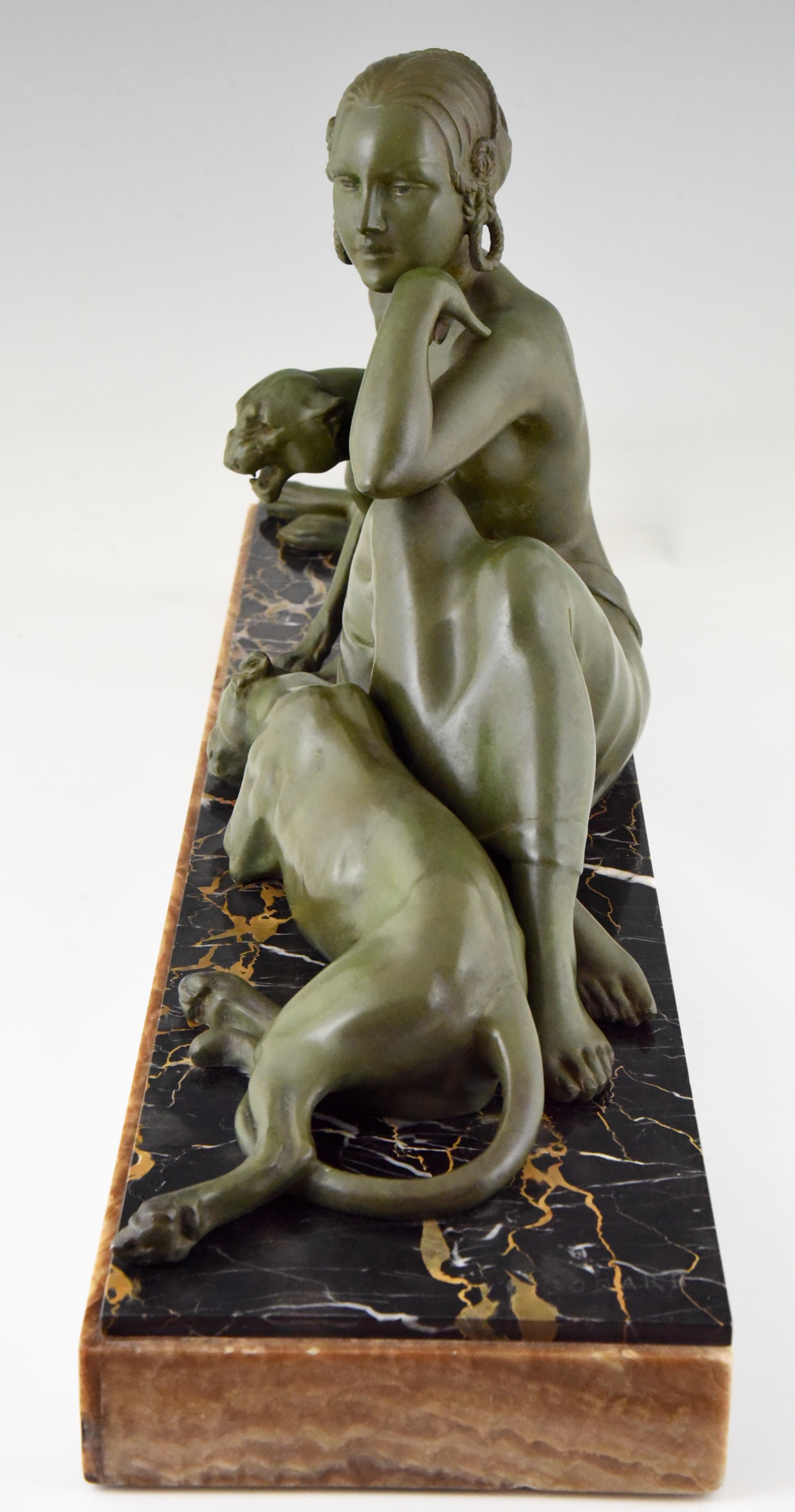 Art déco Sculpture Art Déco Dame avec deux panthères Armand Godard France 1930