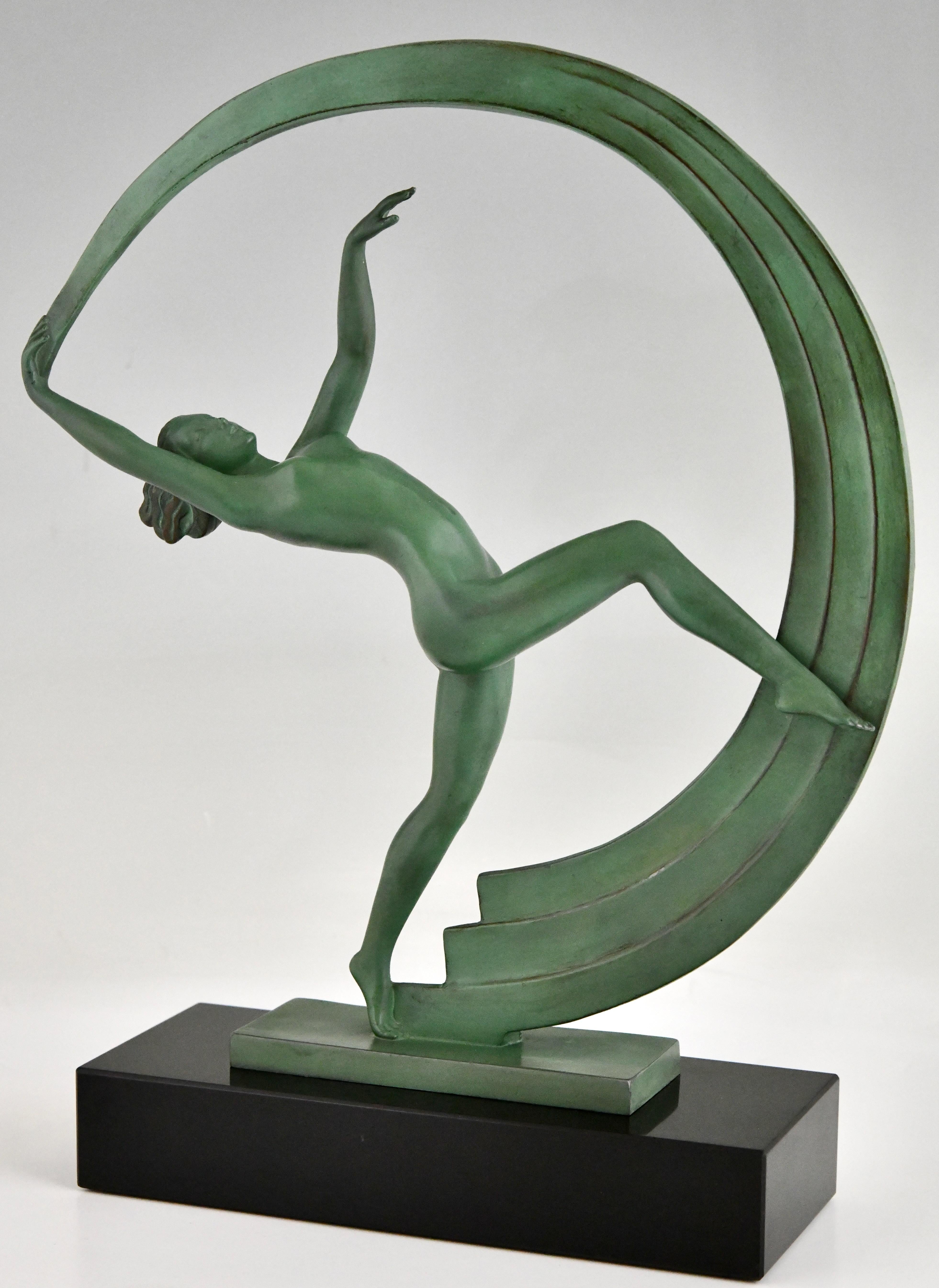 Art Deco sculpture nude dancer with scarf Bacchanale by Janle for Max Le Verrier.
Patinated art metal on a black marble base. 
France 1930. 
This sculpture is illustrated in 
Art Deco sculpture by Alastair Duncan.