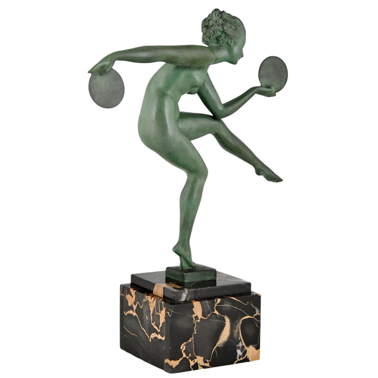 Metal Art Deco sculpture nude disc dancer by Derenne & Max Le Verrier, France 1930. For Sale