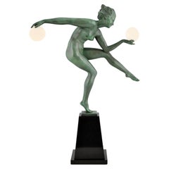 Escultura Art Decó Bailarina desnuda de disco Derenne Marcel Bouraine danse Paienne 1930.