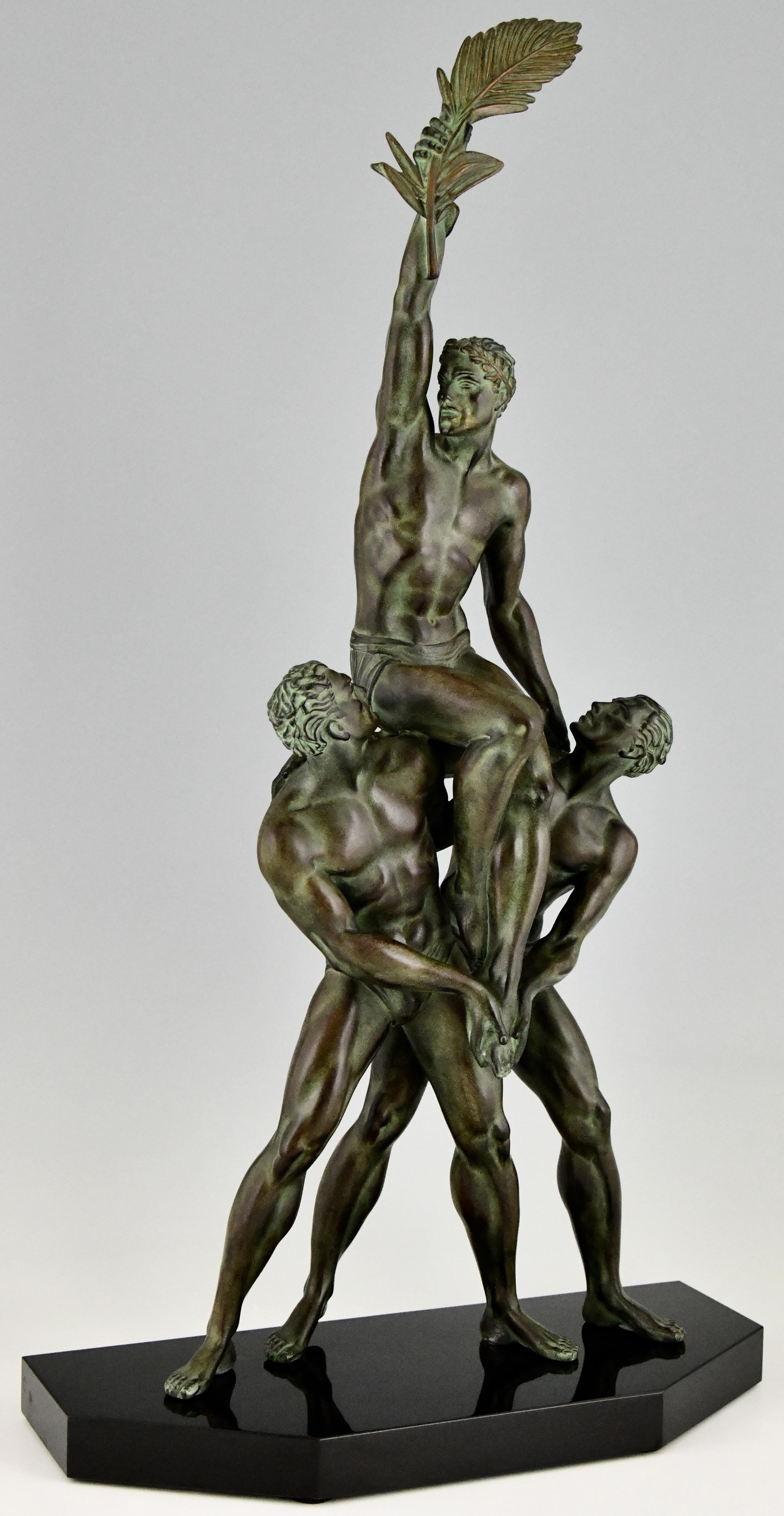 Art Deco sculpture of 3 athletes with palm leaf, Victory. Pierre Le Faguays. Cast at the Max Le Verrier foundry. France 1930. Art metal, green patina with lighter shades. Belgian Black marble. 

Literature:
Bronzes, sculptors and founders by H.