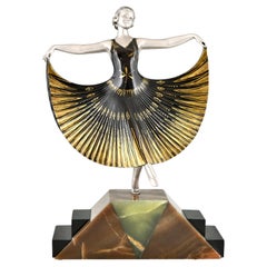 Escultura Art Déco de una bailarina firmada por Andre Gilbert
