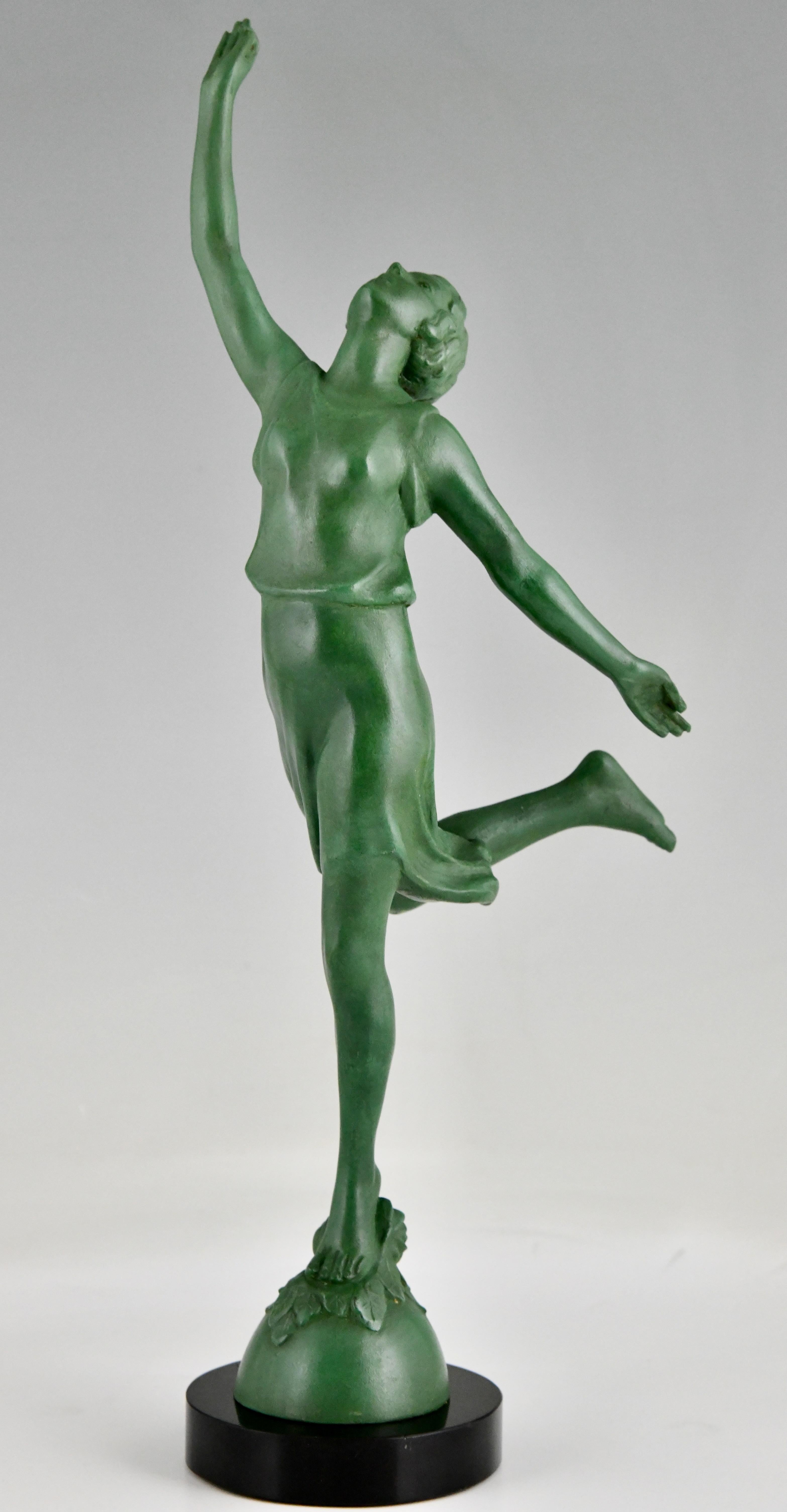 Art Deco sculpture of a dancer signed by P. Sega.
Patinated metal on a circular Belgian Black Marble base.
France 1930. 