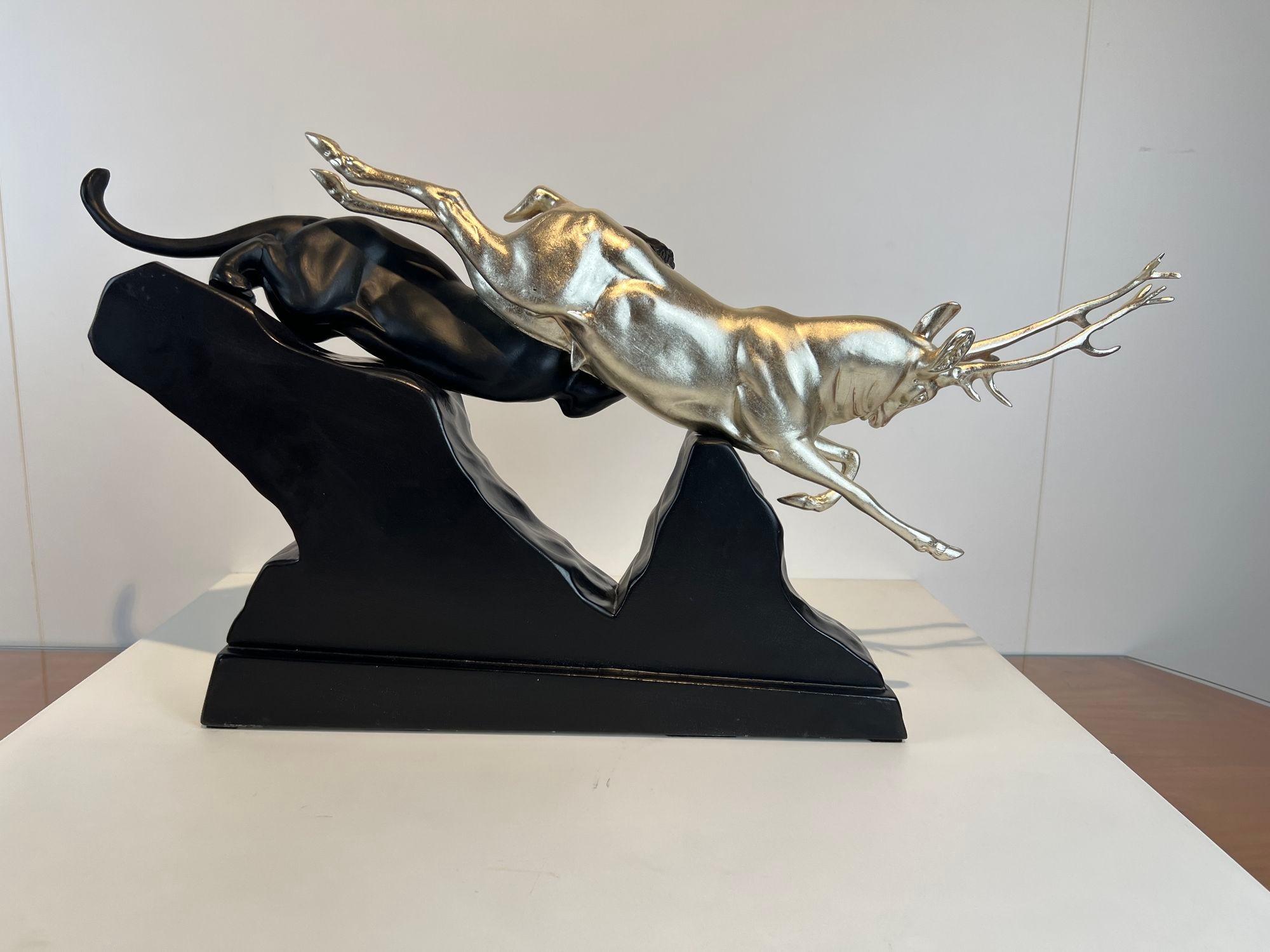 Expressive original art deco sculpture of a panther and deer running in battle from France around 1930.
By Irenee Rochard, engraving signature in the plinth.
Regule / art cast on a granite base.
Refinished condition.
The Deer light color and coated