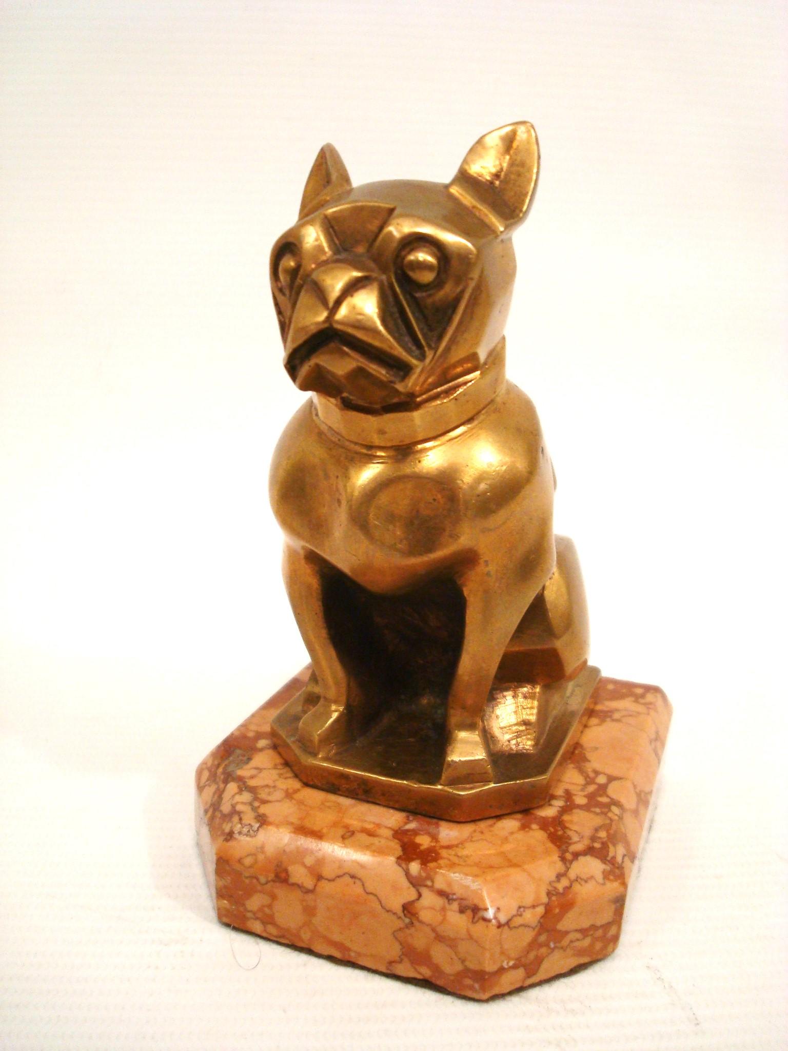 Art Deco or Cubist Bronze sculpture of a French bulldog bookend or paperweight.
Made of  bronze, mounted over a marble base.
Made in France, 1920s. Marked France.

We have specialized in the sale of Art Deco and Art Nouveau and Vintage styles since