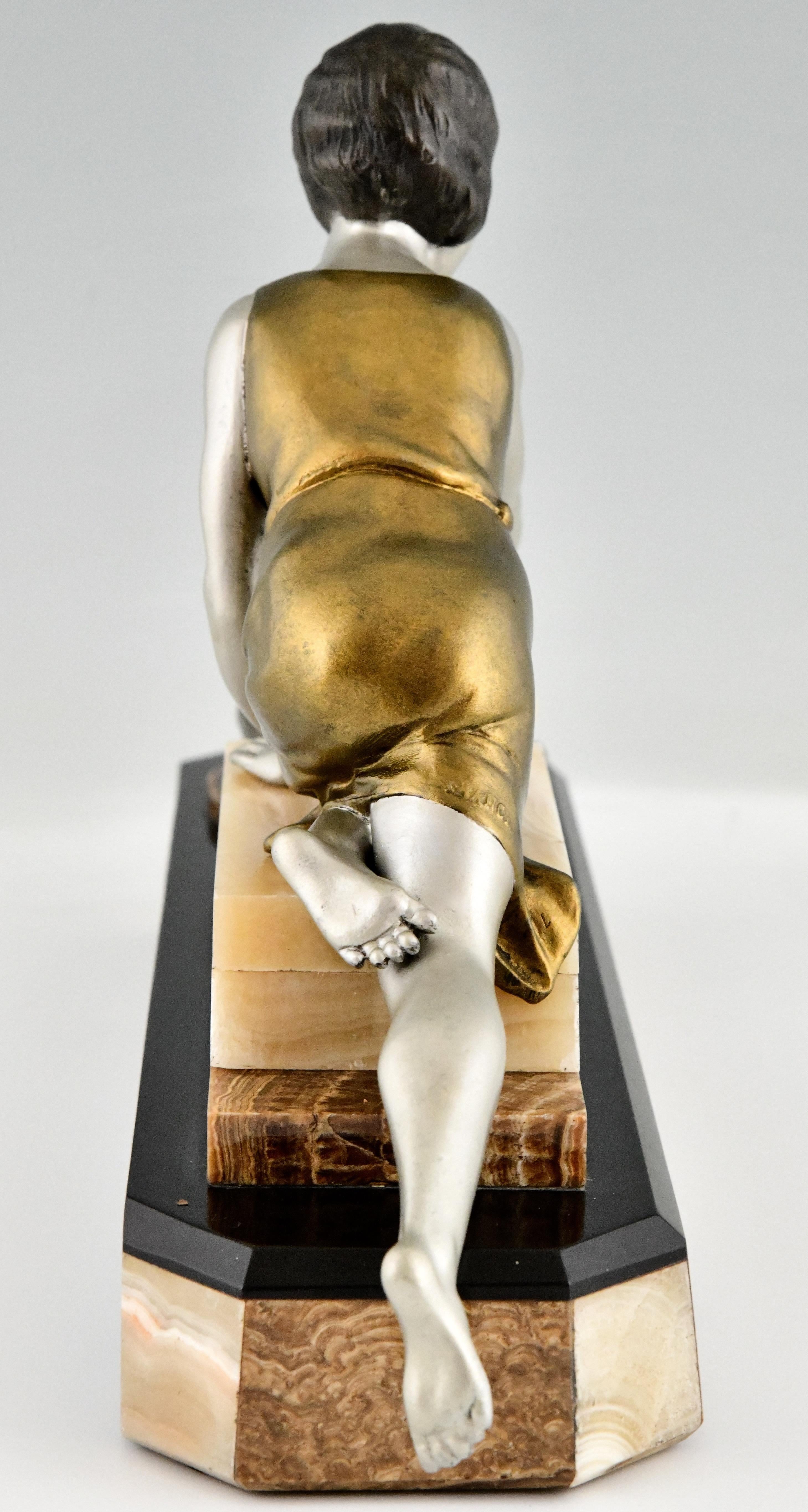 Mid-20th Century Art Deco Sculpture of a Girl Playing with a Cat by Uriano France 1930 For Sale