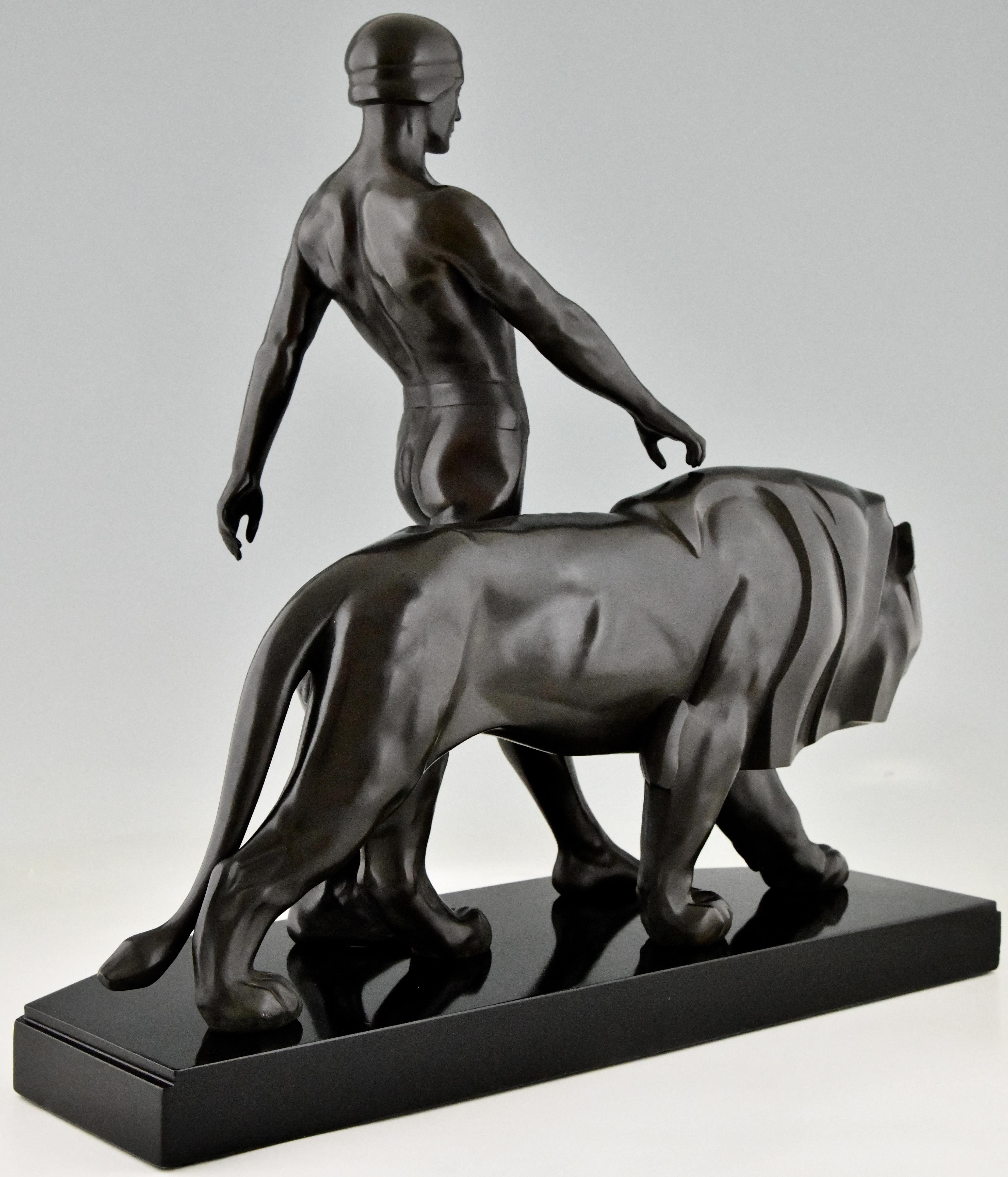 Art Deco Sculpture of a Male Nude Walking with Lion Belluaire Max Le Verrier 192 1