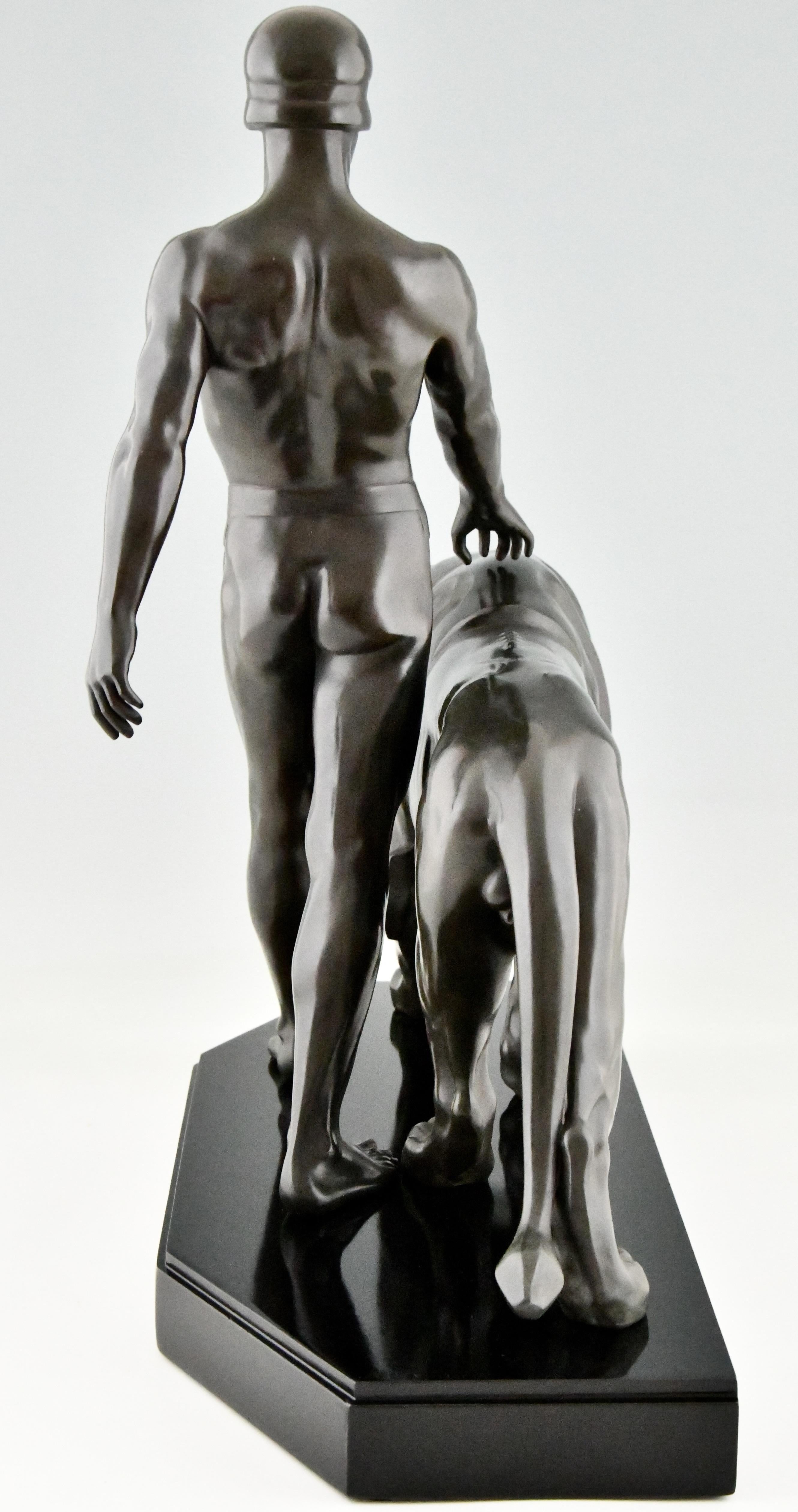 Art Deco Sculpture of a Male Nude Walking with Lion Belluaire Max Le Verrier 192 3