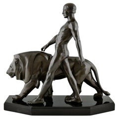 Art Deco Sculpture of a Male Nude Walking with Lion Belluaire Max Le Verrier 192