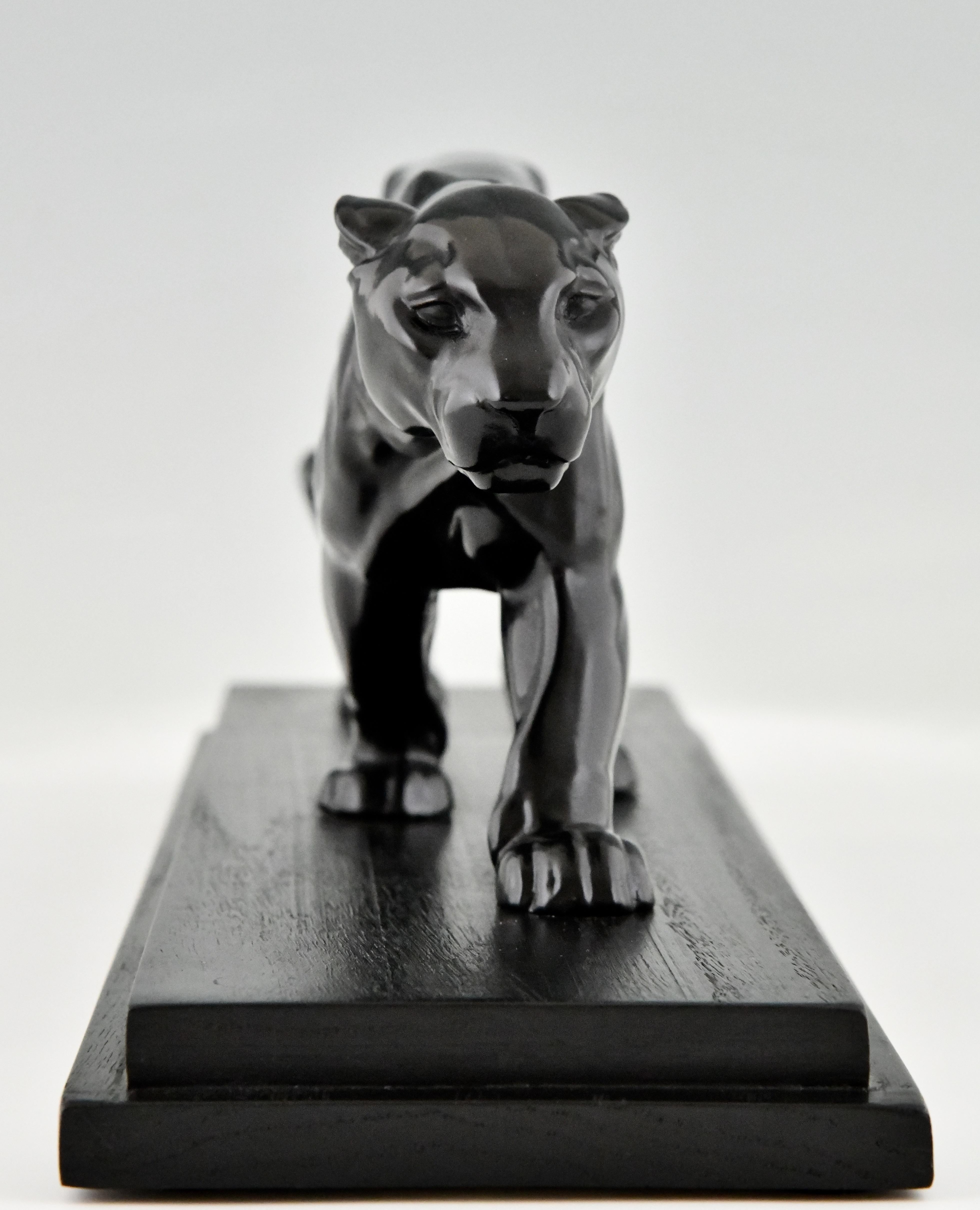 Patinated Art Deco Sculpture of a Panther by Alexandre Ouline, France 1930