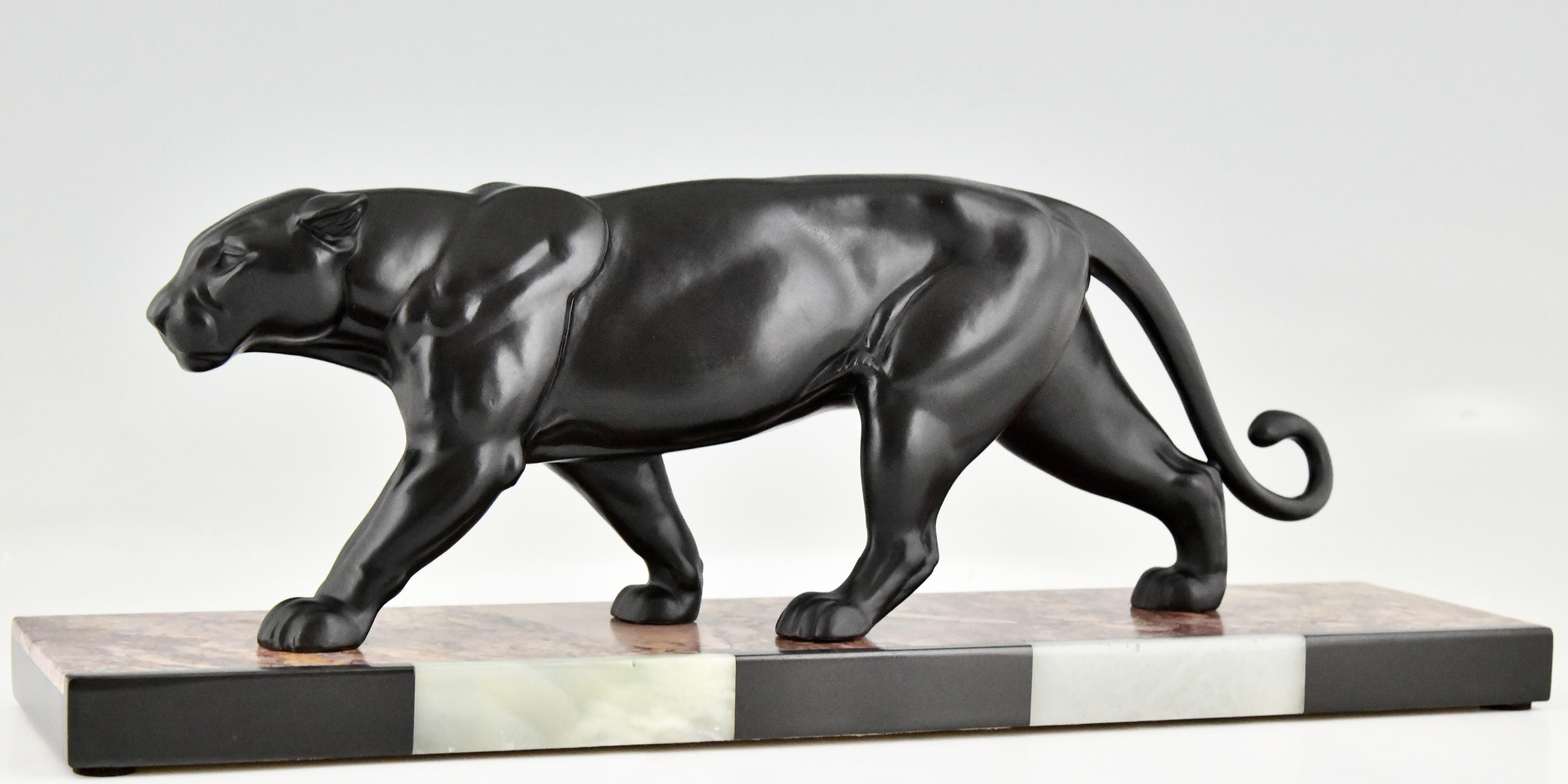 Art Deco sculpture of a panther by Alexandre Ouline.
The artist worked in France between 1918-1940.
The sculpture is cast in Art Metal and has a black patina, it stands on a marble base with inlay. 
France ca. 1930.

Animals in bronze by
