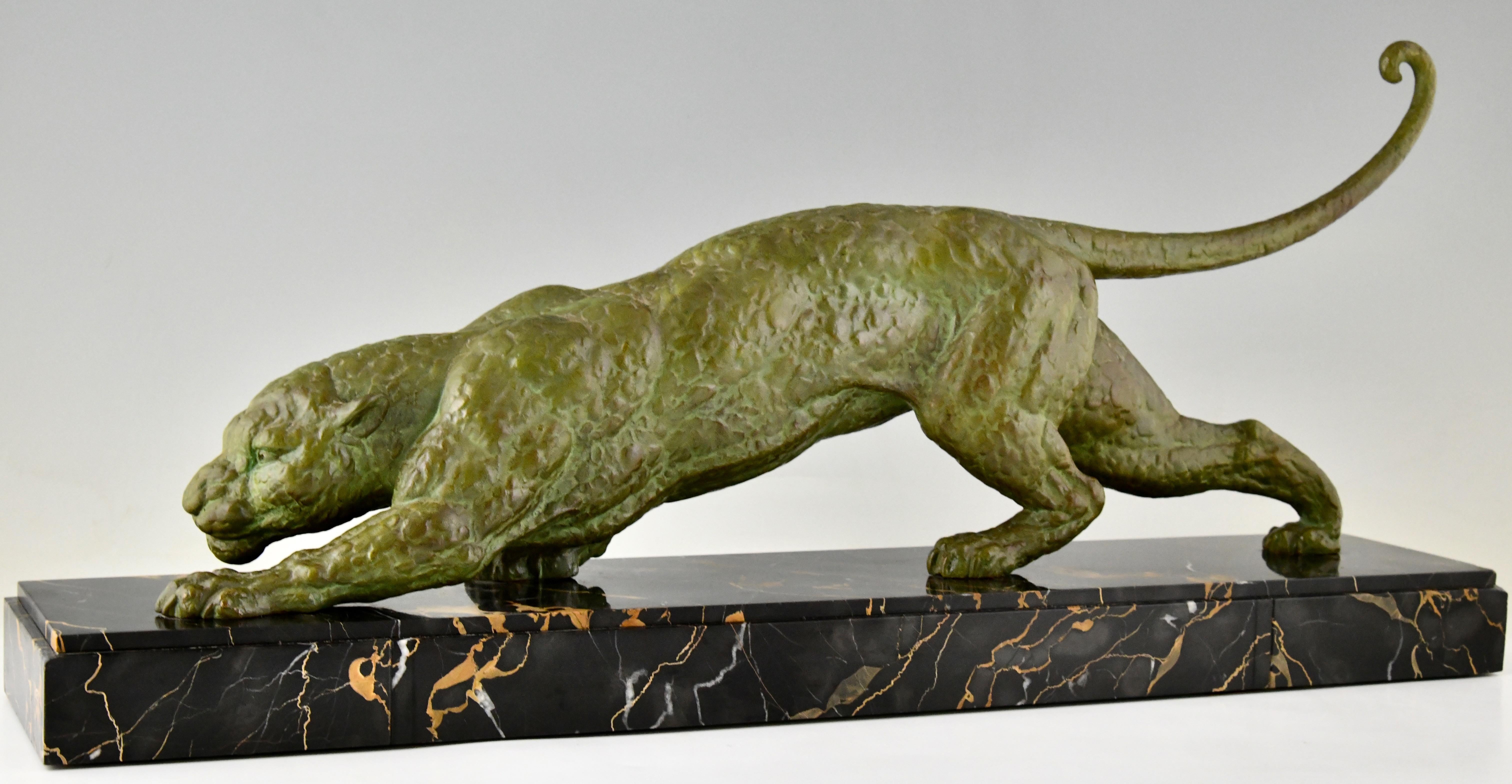 Art Deco sculpture of a panther by Demetre Chiparus. 
Art metal with beautiful patina on a marble base with inlay. 
France 1930.
This panther is illustrated in:
Chiparus master of Art Deco, A. Shayo. 

General information:
Art Deco and other