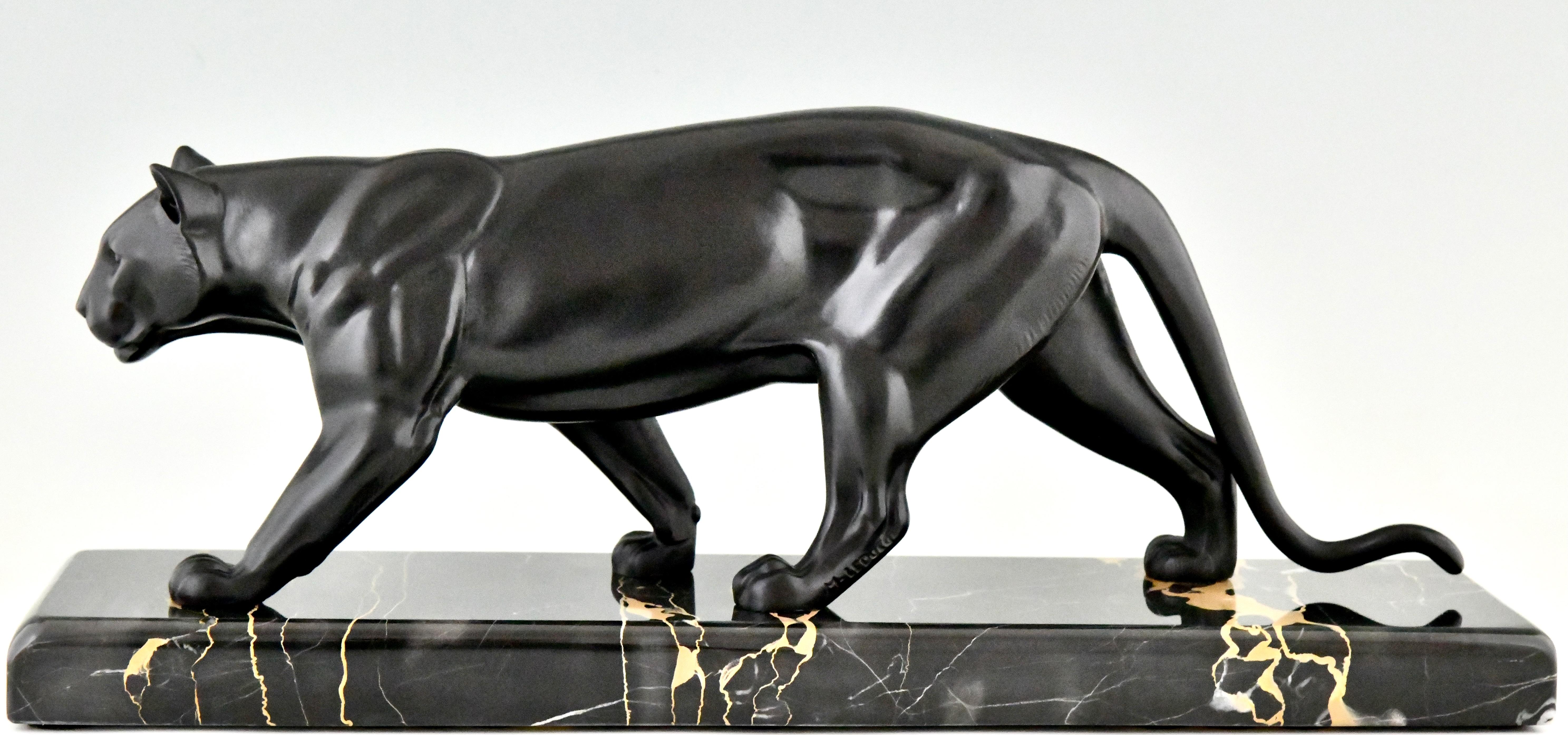 Metal Art Deco sculpture of a panther by M. Leducq, France 1930 For Sale