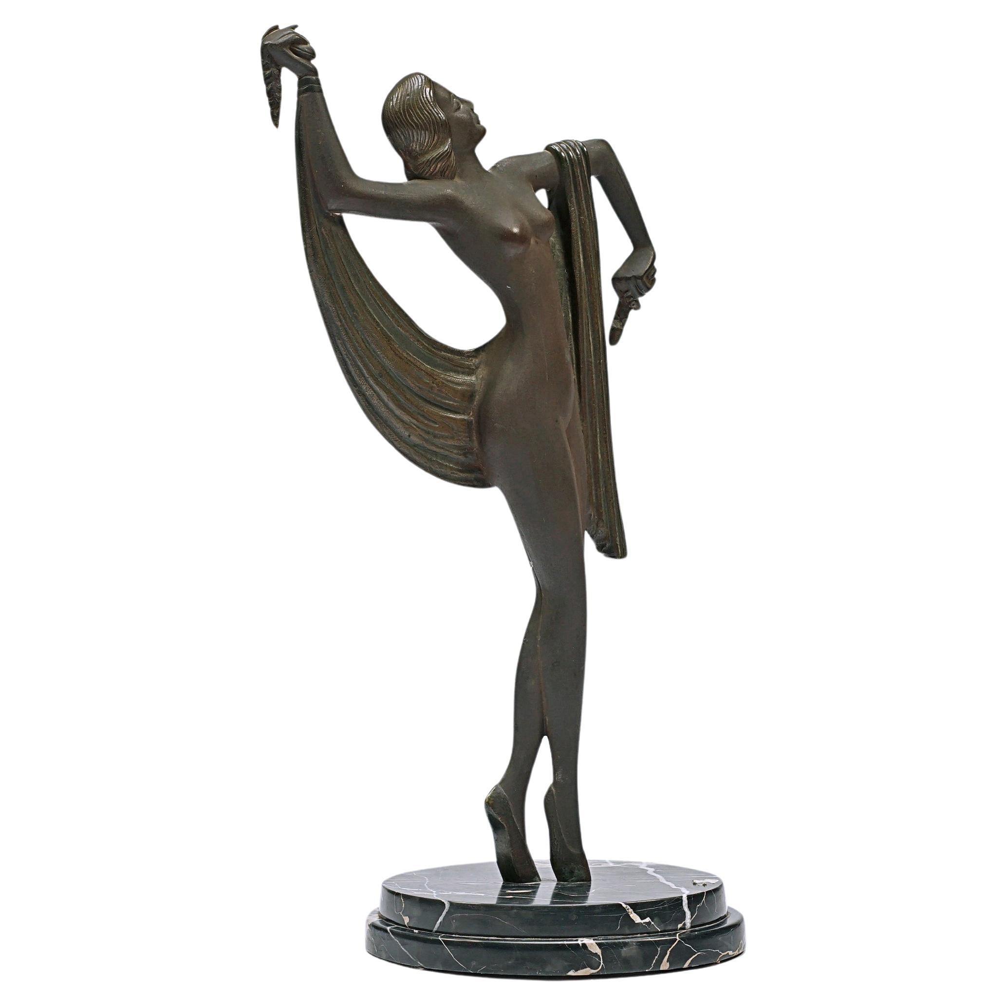 Art Deco sculpture of a woman with a veil