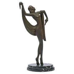 Art Deco sculpture of a woman with a veil