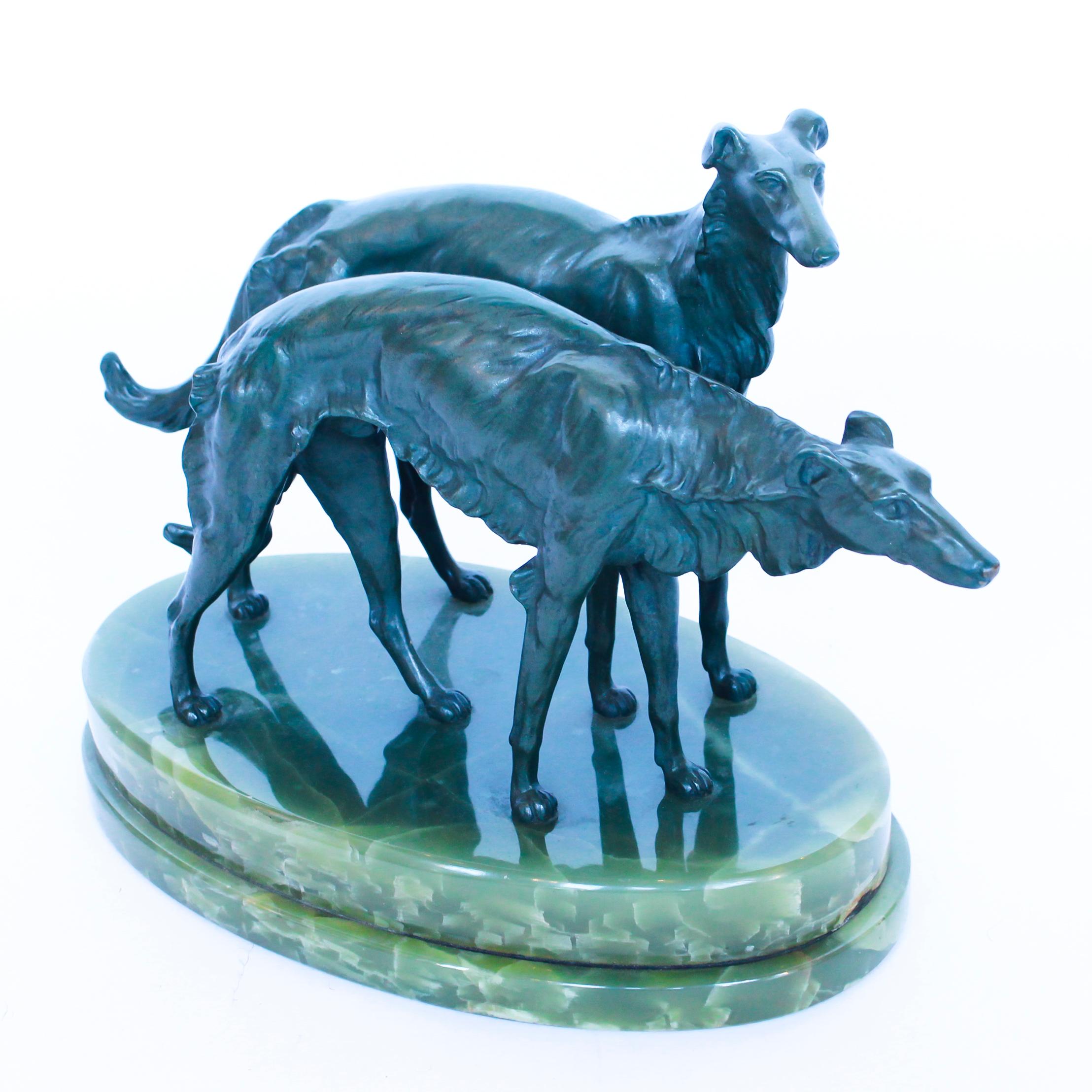 An Art Deco cold painted bronze sculpture of two borzoi dogs set on a green onyx base.

Dimensions: H 30cm, W 30cm, D 15cm

Origin: French

Date: circa 1930

Item no: 2201205.