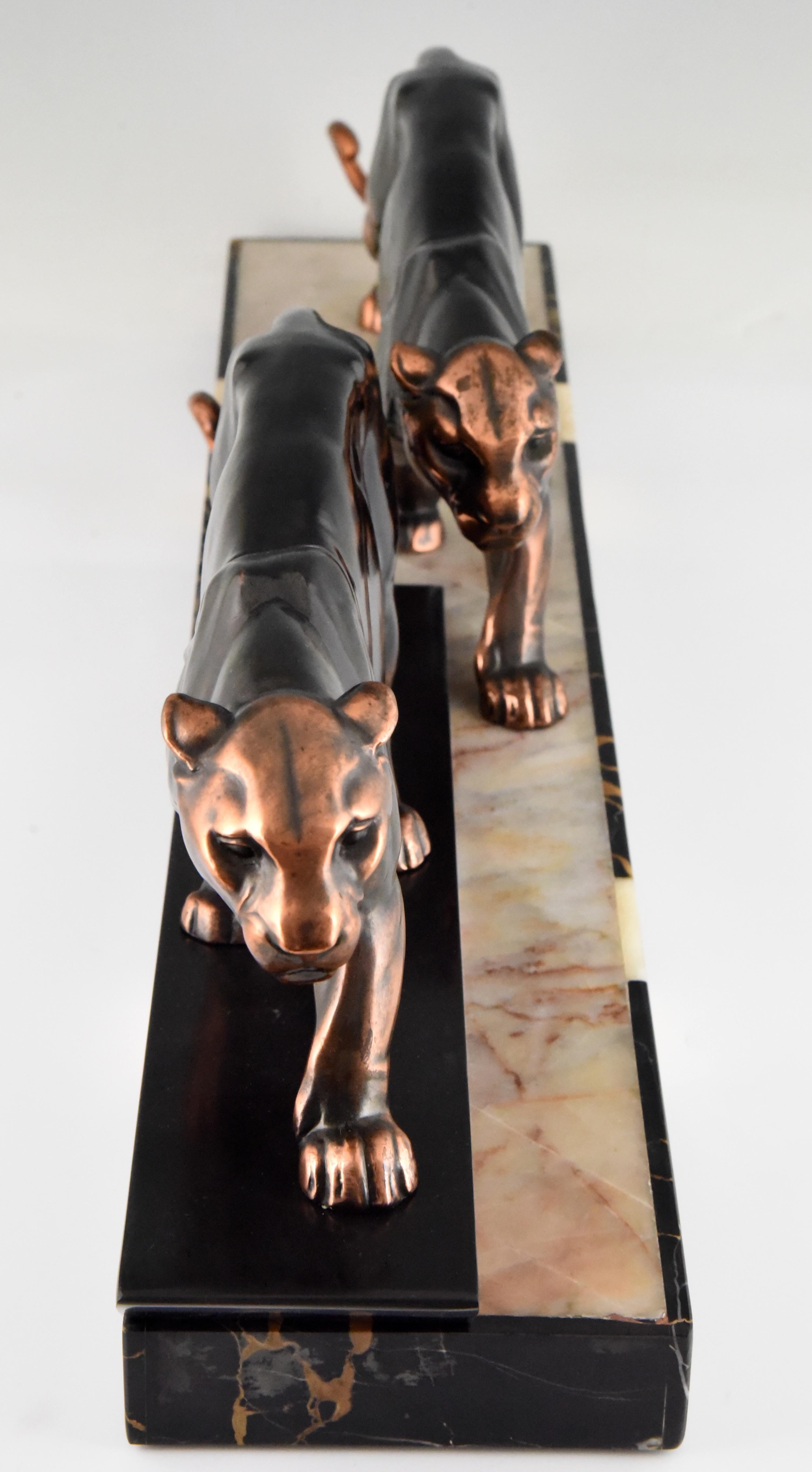 Patinated Art Deco Sculpture of Two Panthers Alexandre Ouline, France, 1930