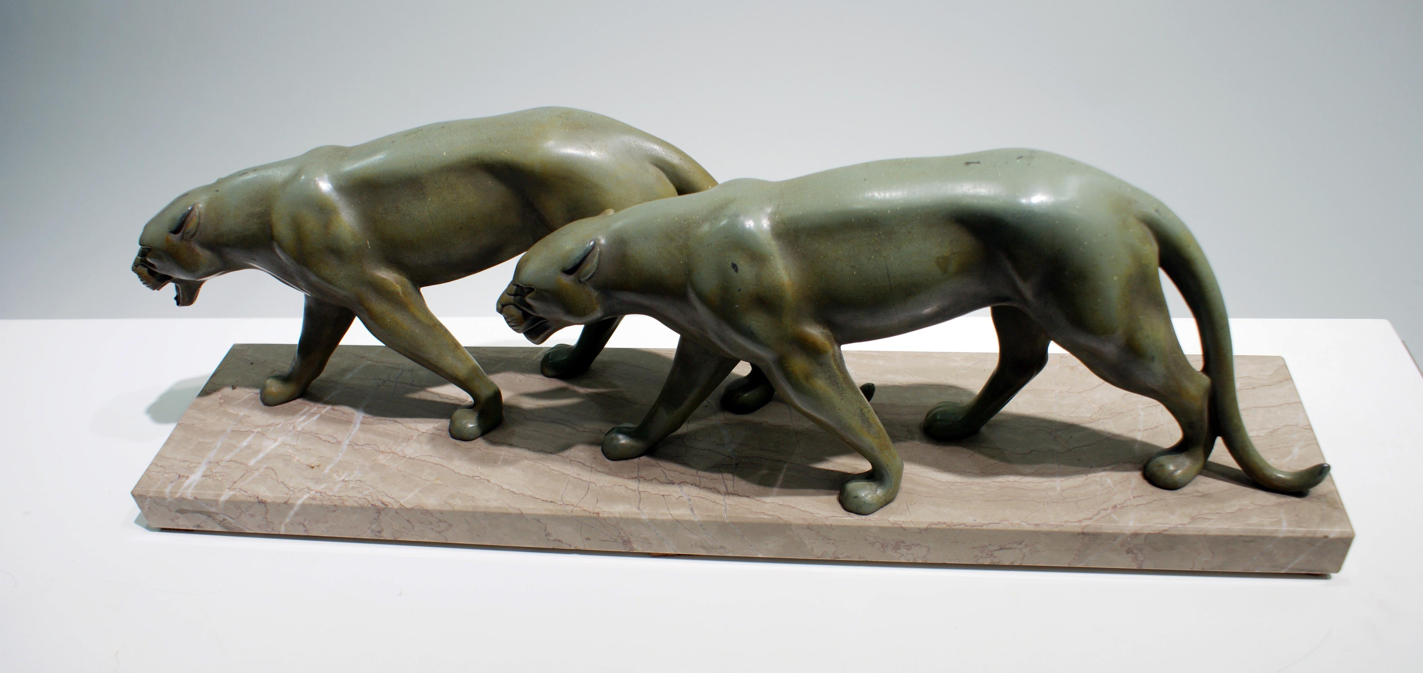 Patinated Art Deco Sculpture of Two Panthers Attributed to Alexandre Ouline